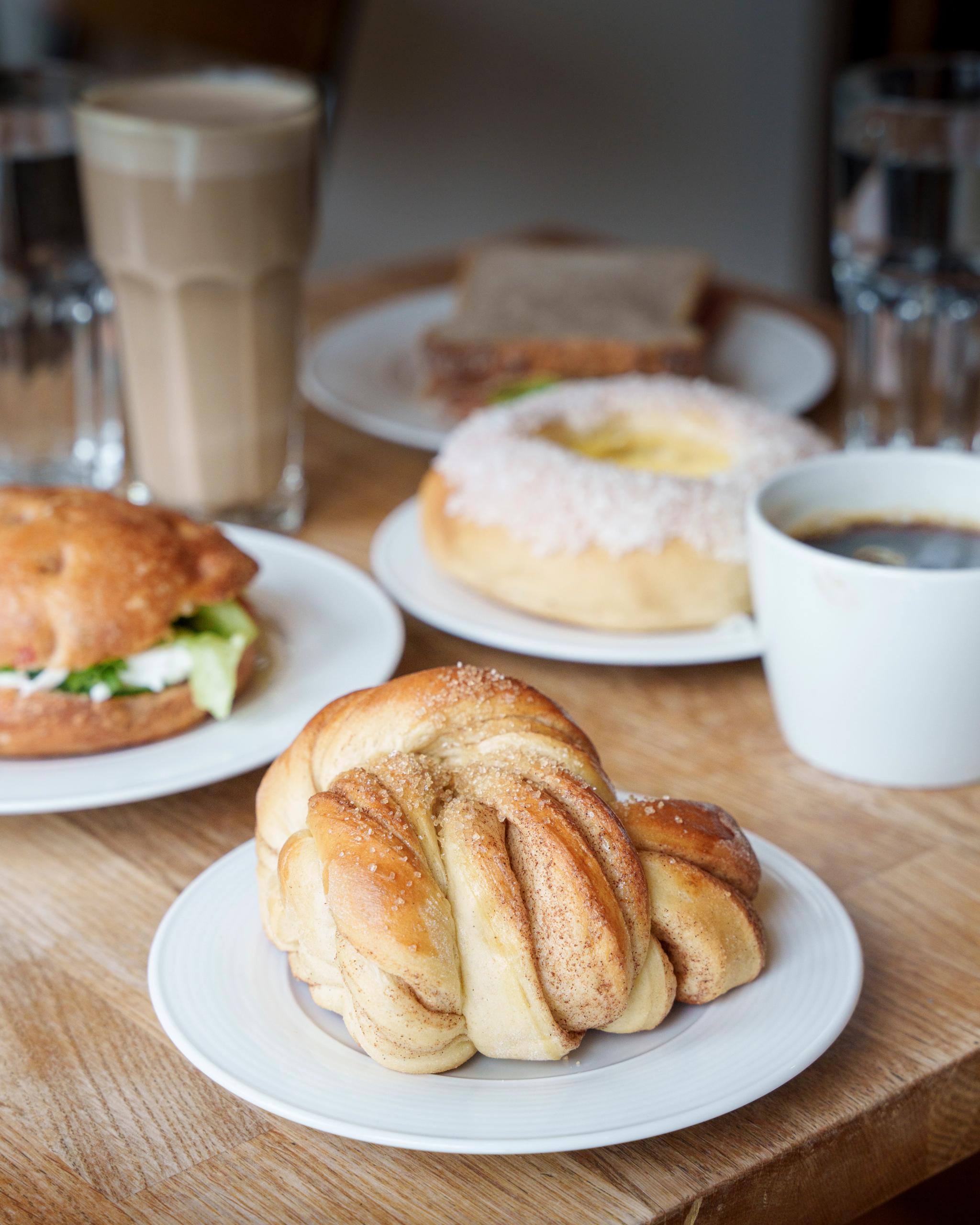 A cinnamon bun on a plate.