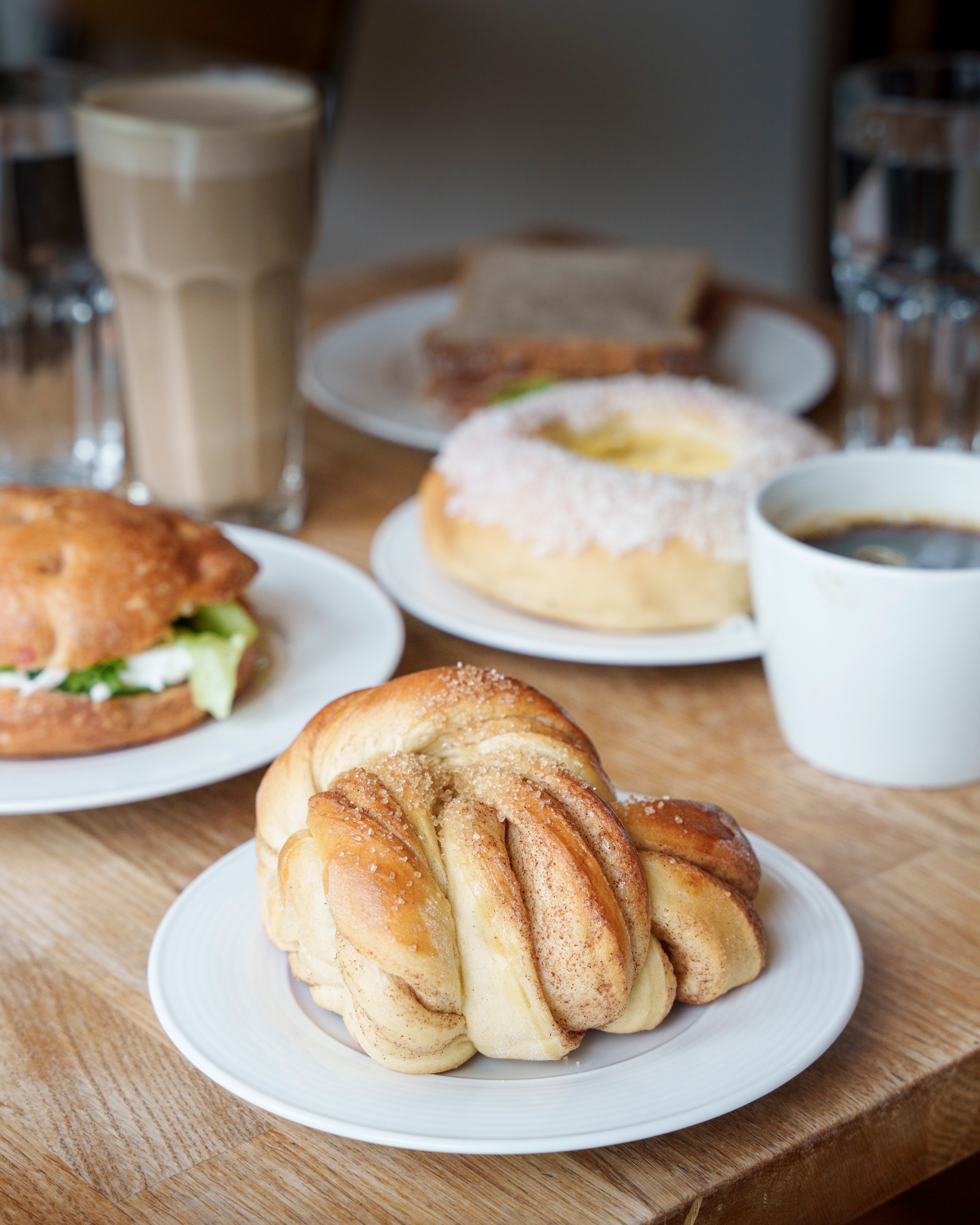 A cinnamon bun on a plate.