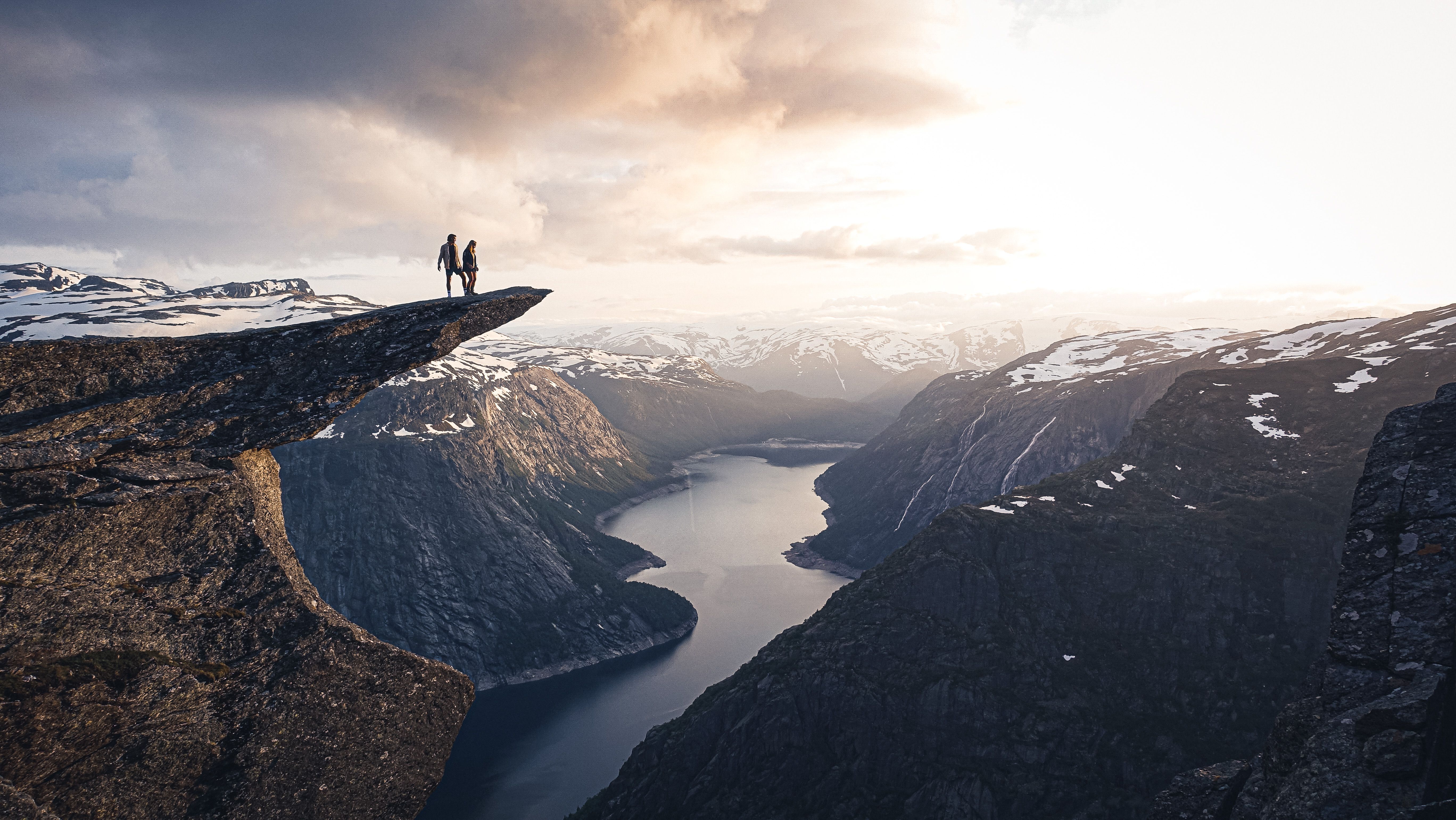 Two people on the top of Trolltunga.