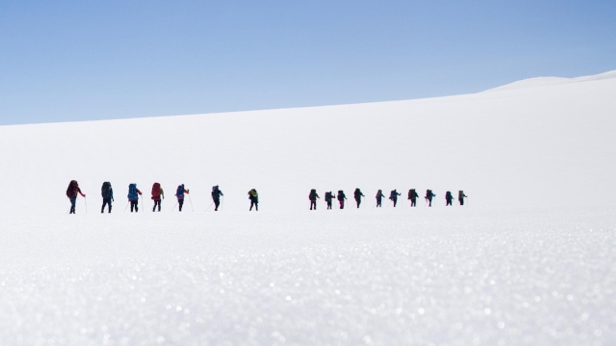 People skiing on Jostedalsbreen glacier