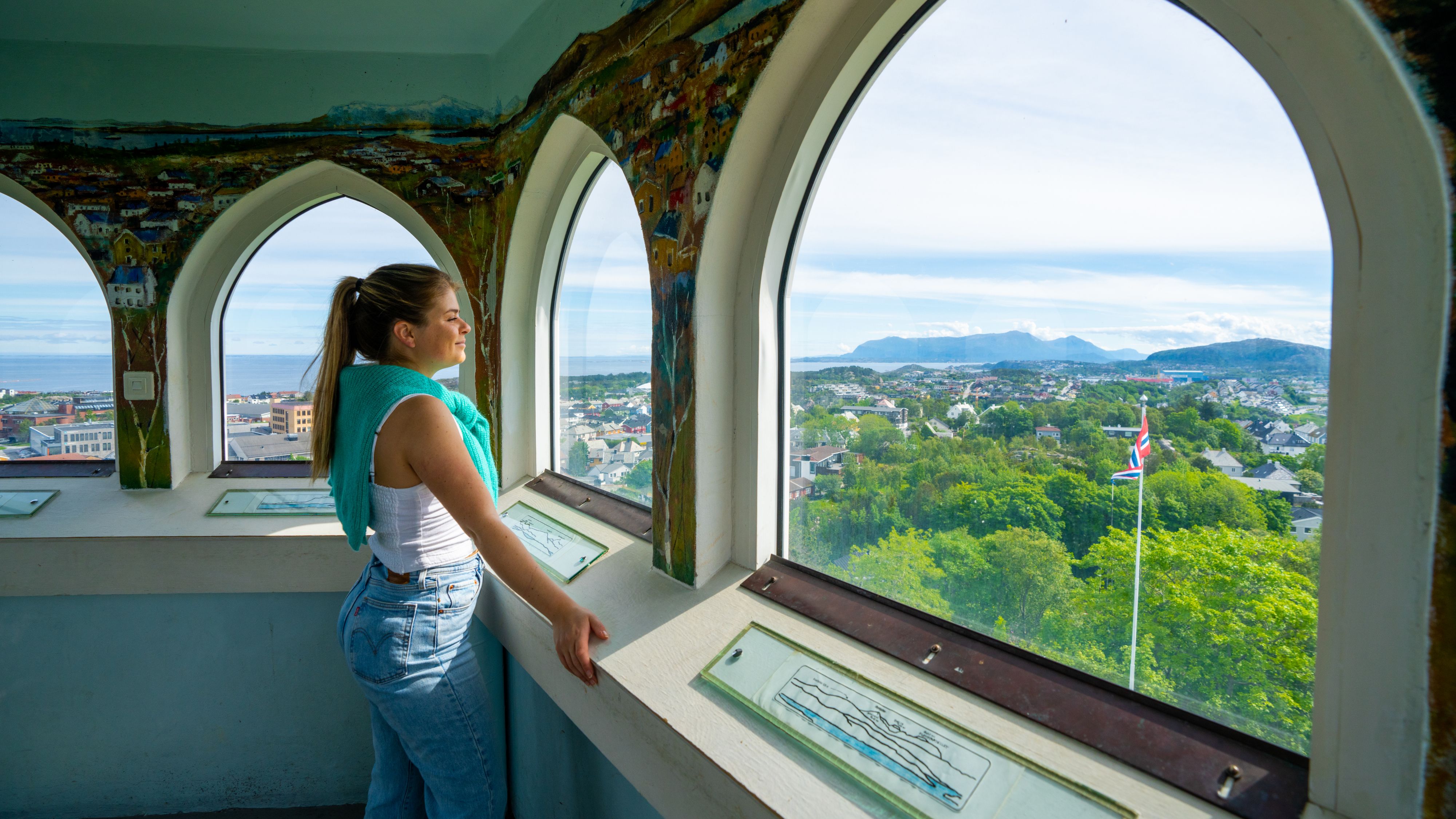 A woman up in the tower at Varden viewpoint in Kristiansund