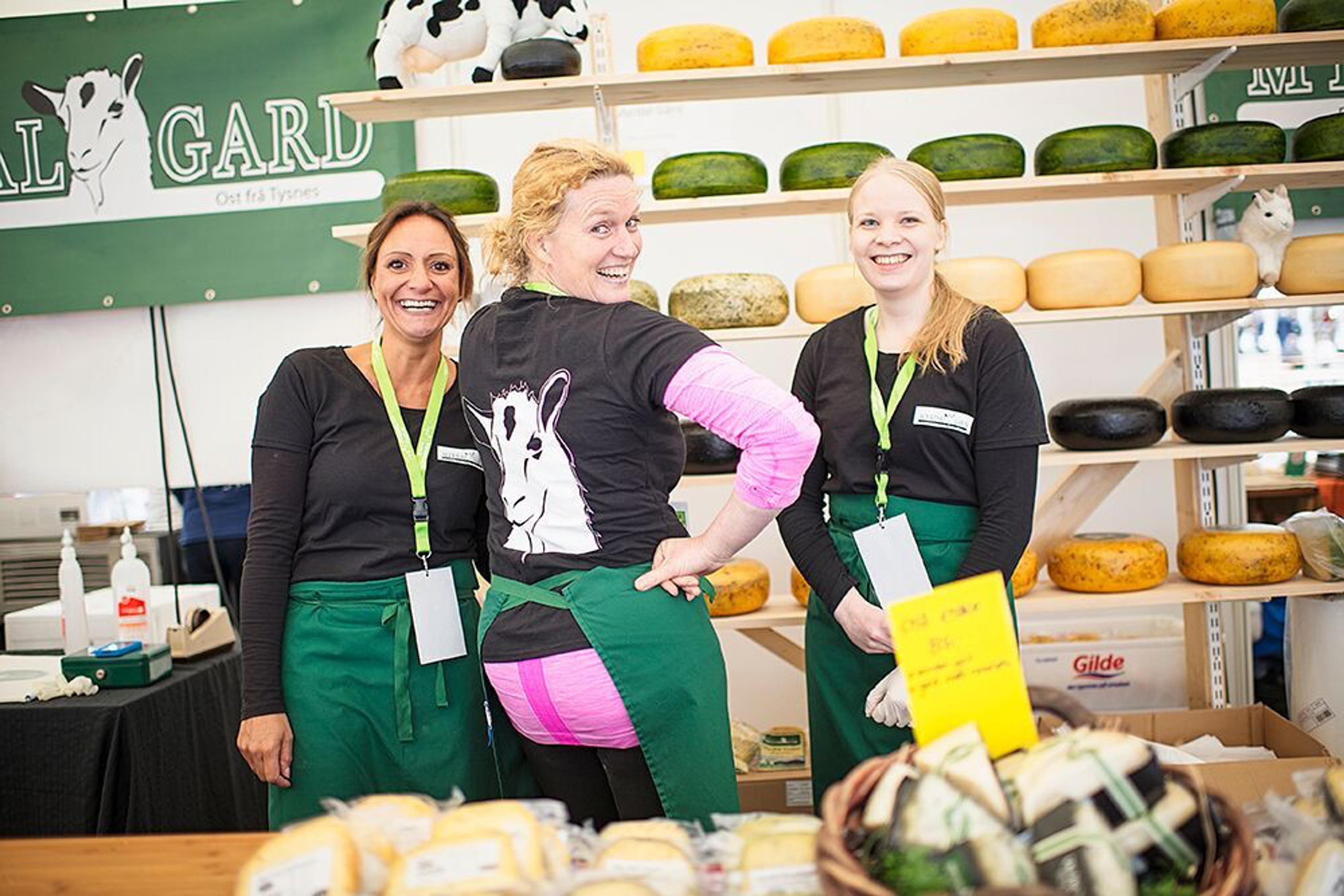 Three girls selling cheese at Bergen Food Festival