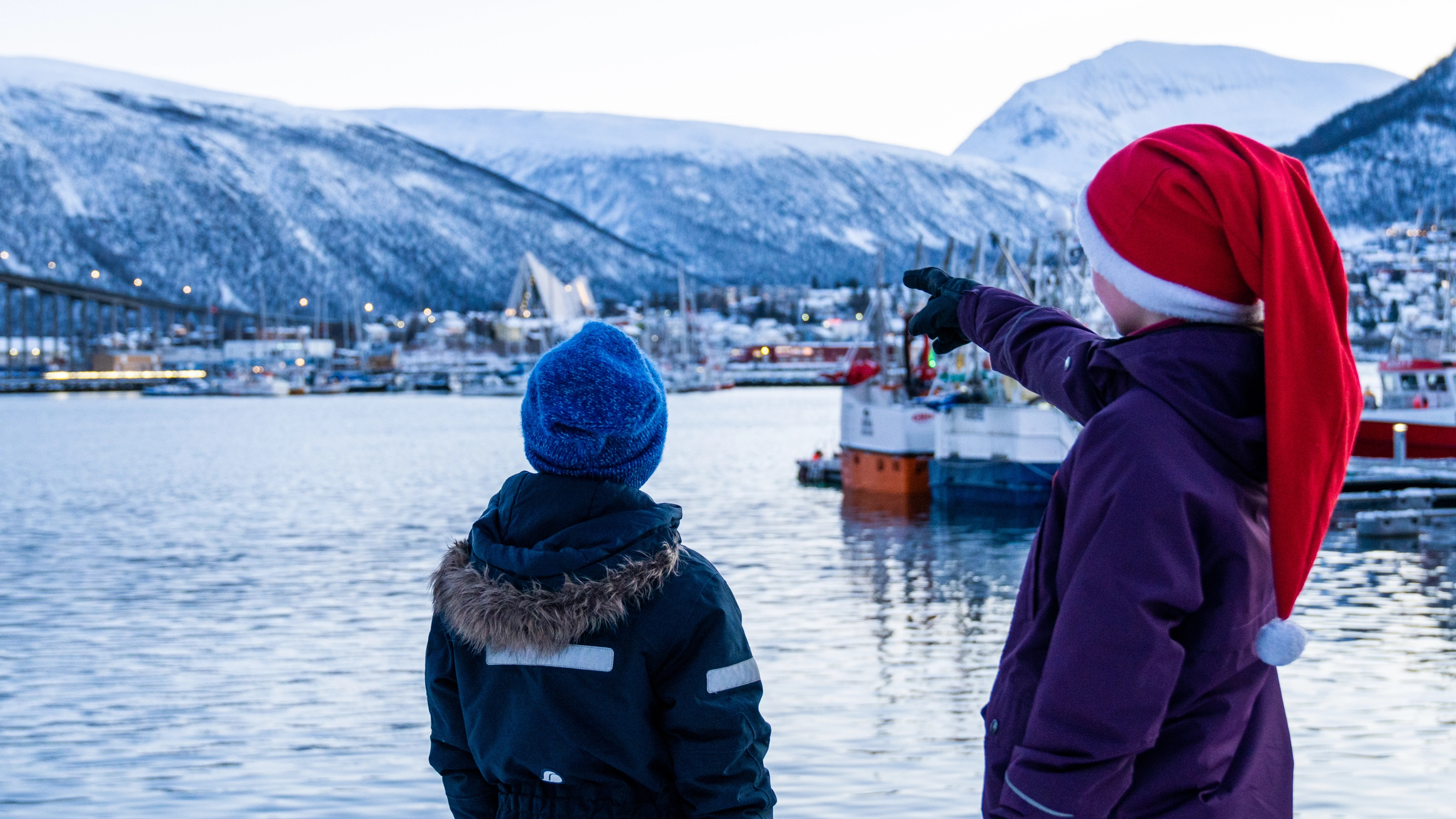 Kids with Santa hats at the harbor in Tromsø