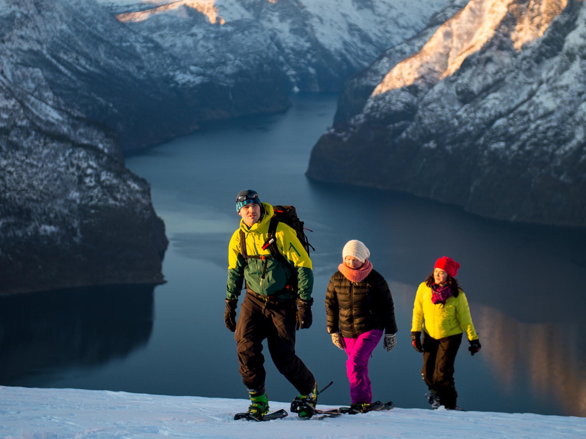 A family of three snowshoeing at Aurlandsfjellet