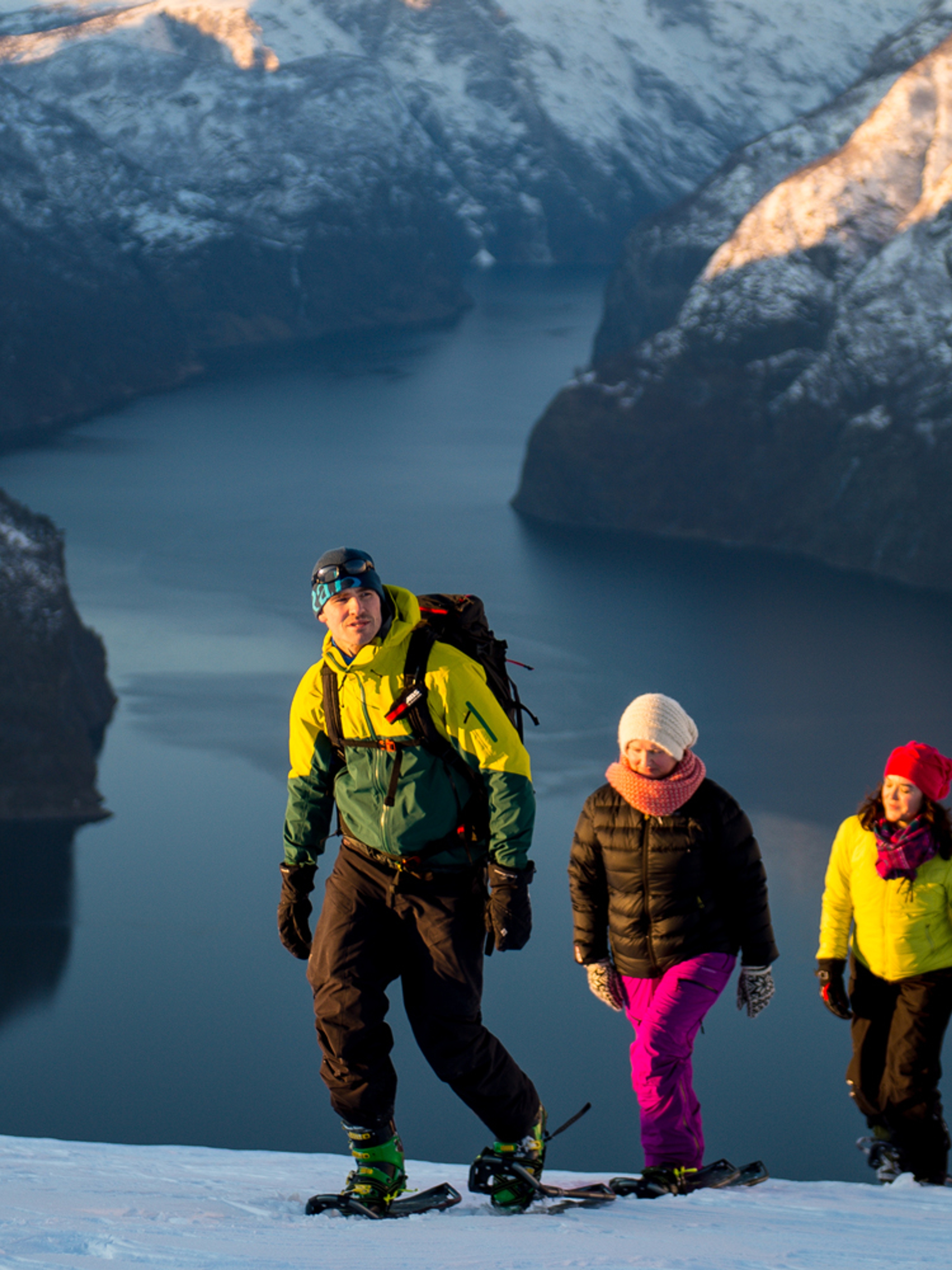 A family of three snowshoeing at Aurlandsfjellet
