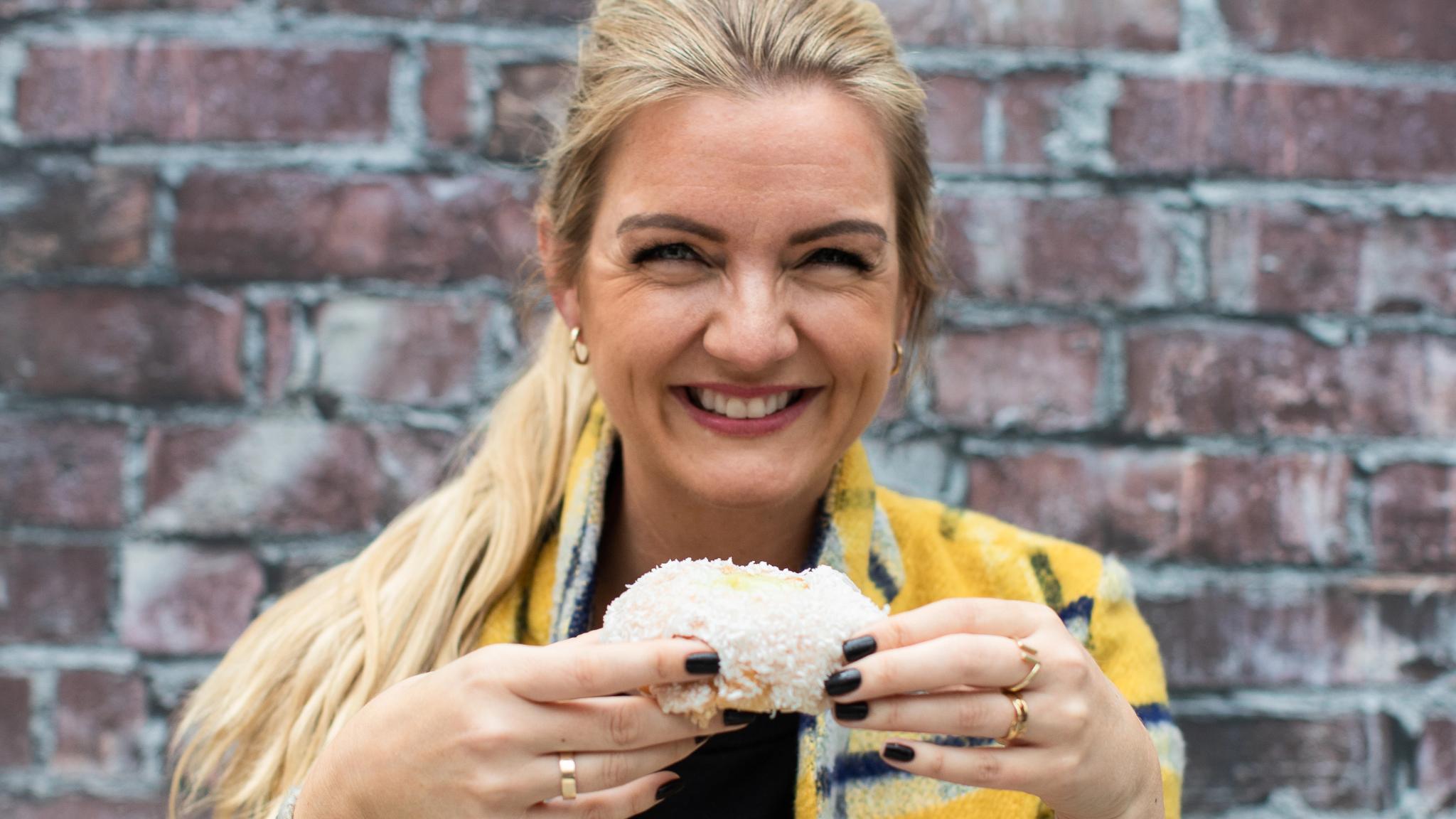 Cookbook author and blogger, Hanne-Lene Dahlgren, eating..
