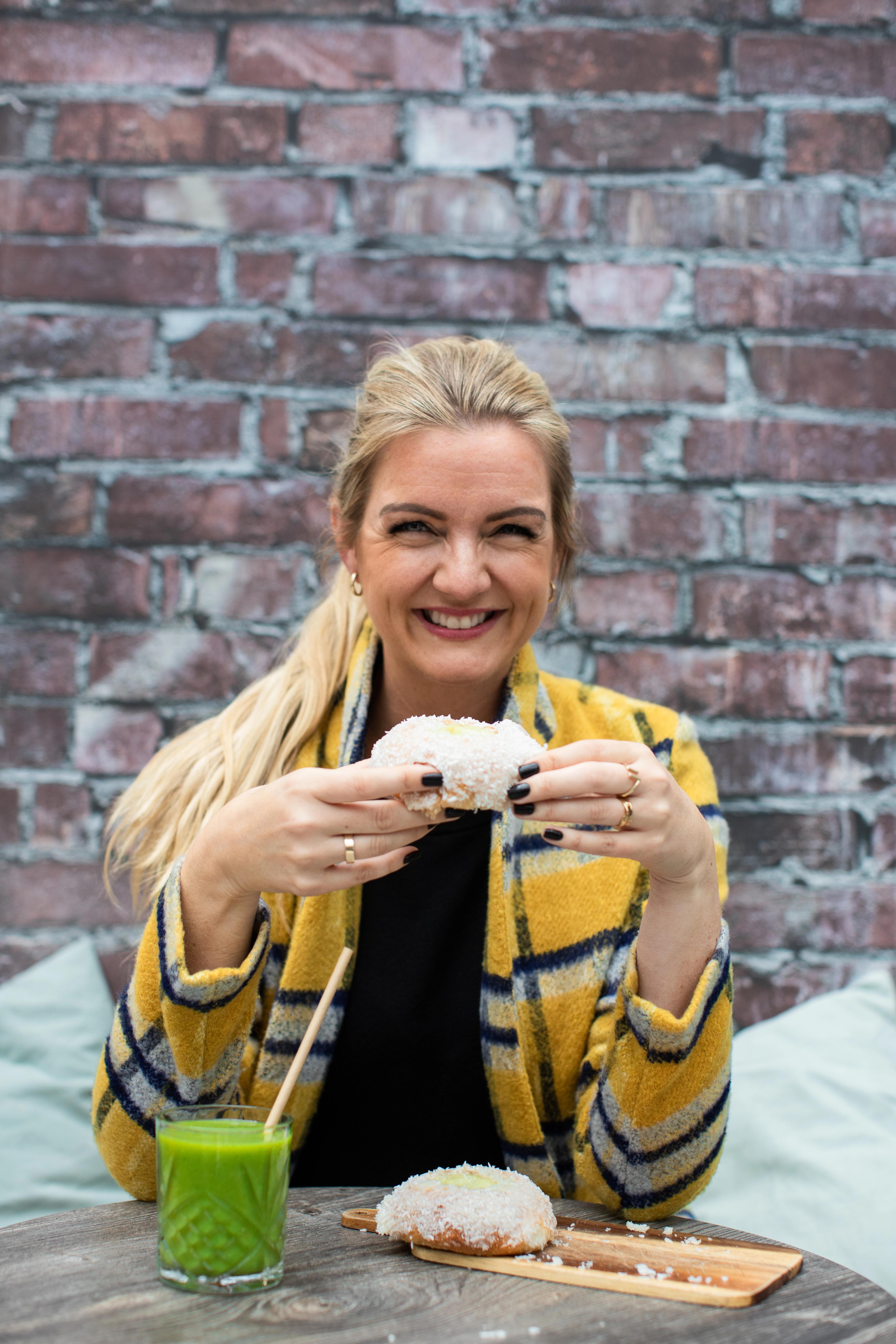 Cookbook author and blogger, Hanne-Lene Dahlgren, eating..