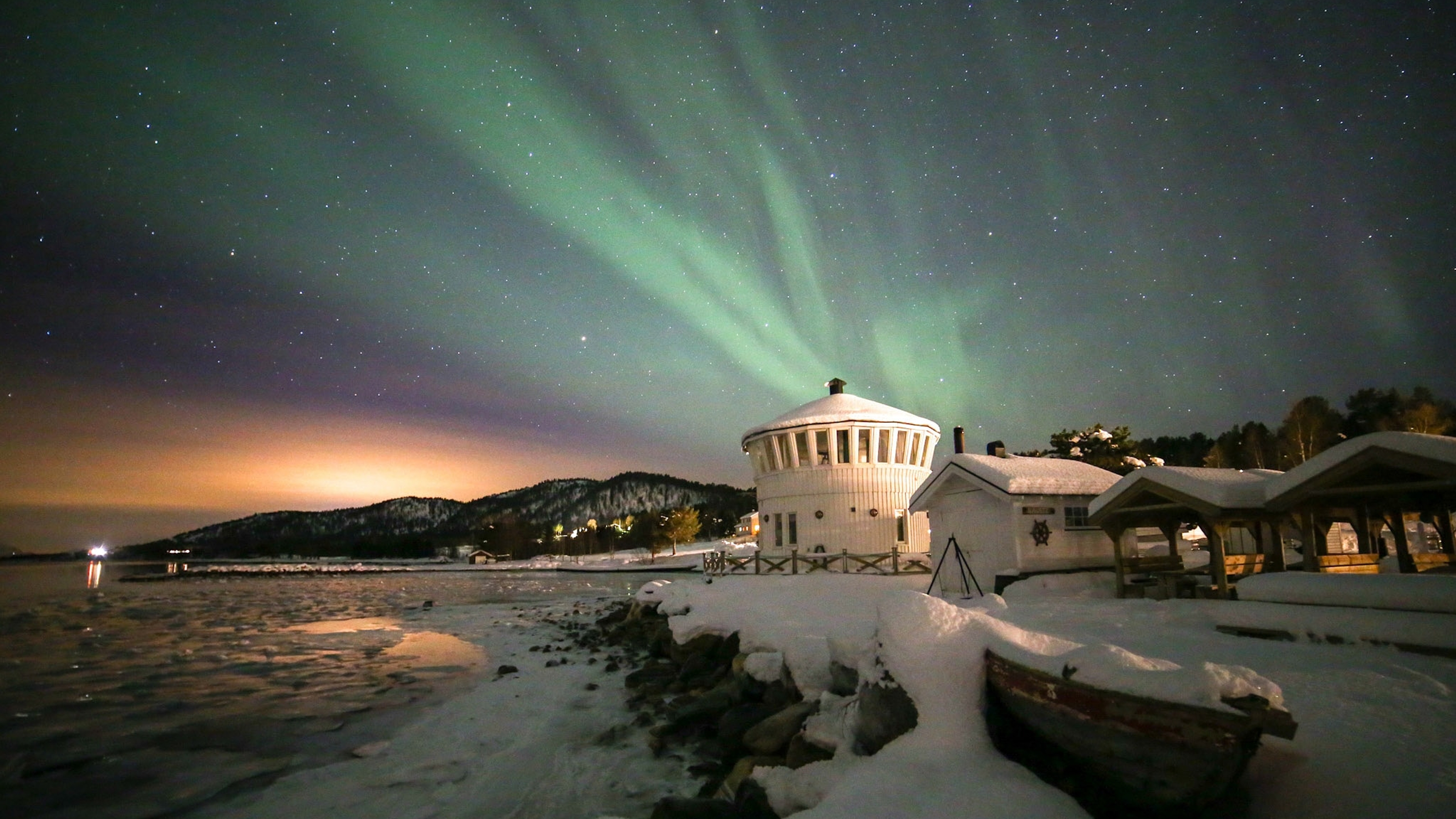 Northern lights over The Lighthouse in Senja