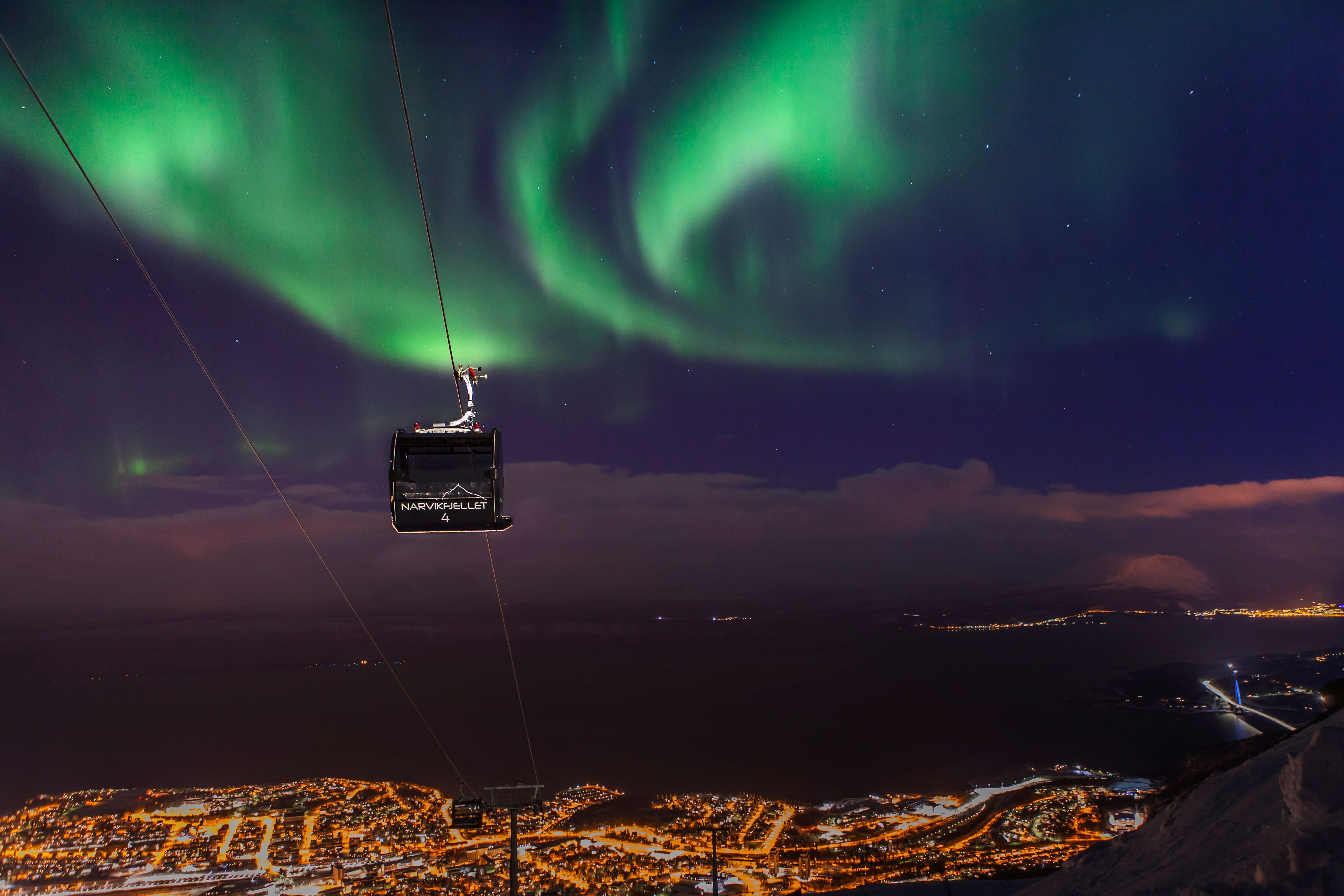 Cable car to Mount Narvikfjellet in northern lights, Northern Norway