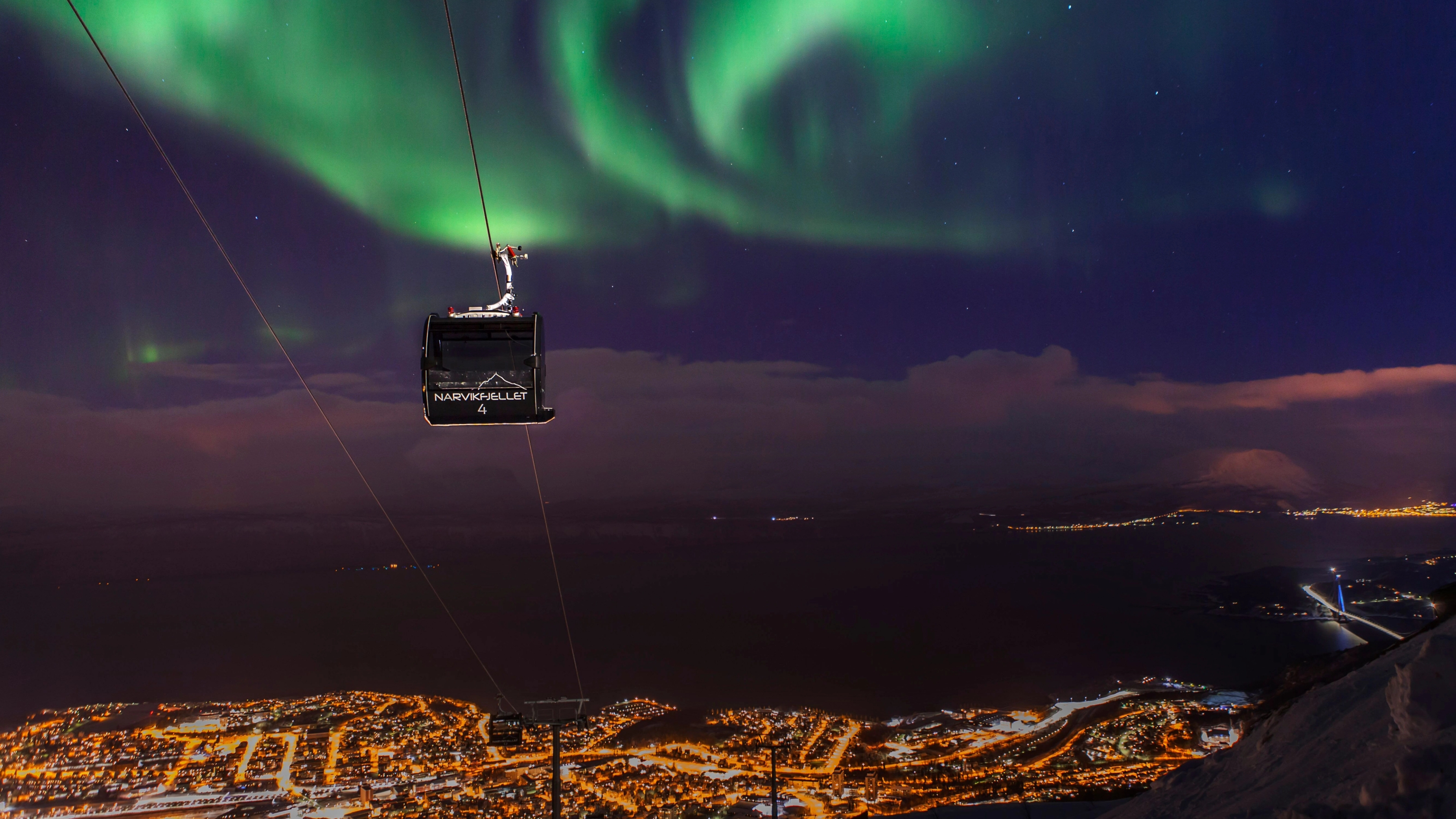 Cable car to Mount Narvikfjellet in northern lights, Northern Norway