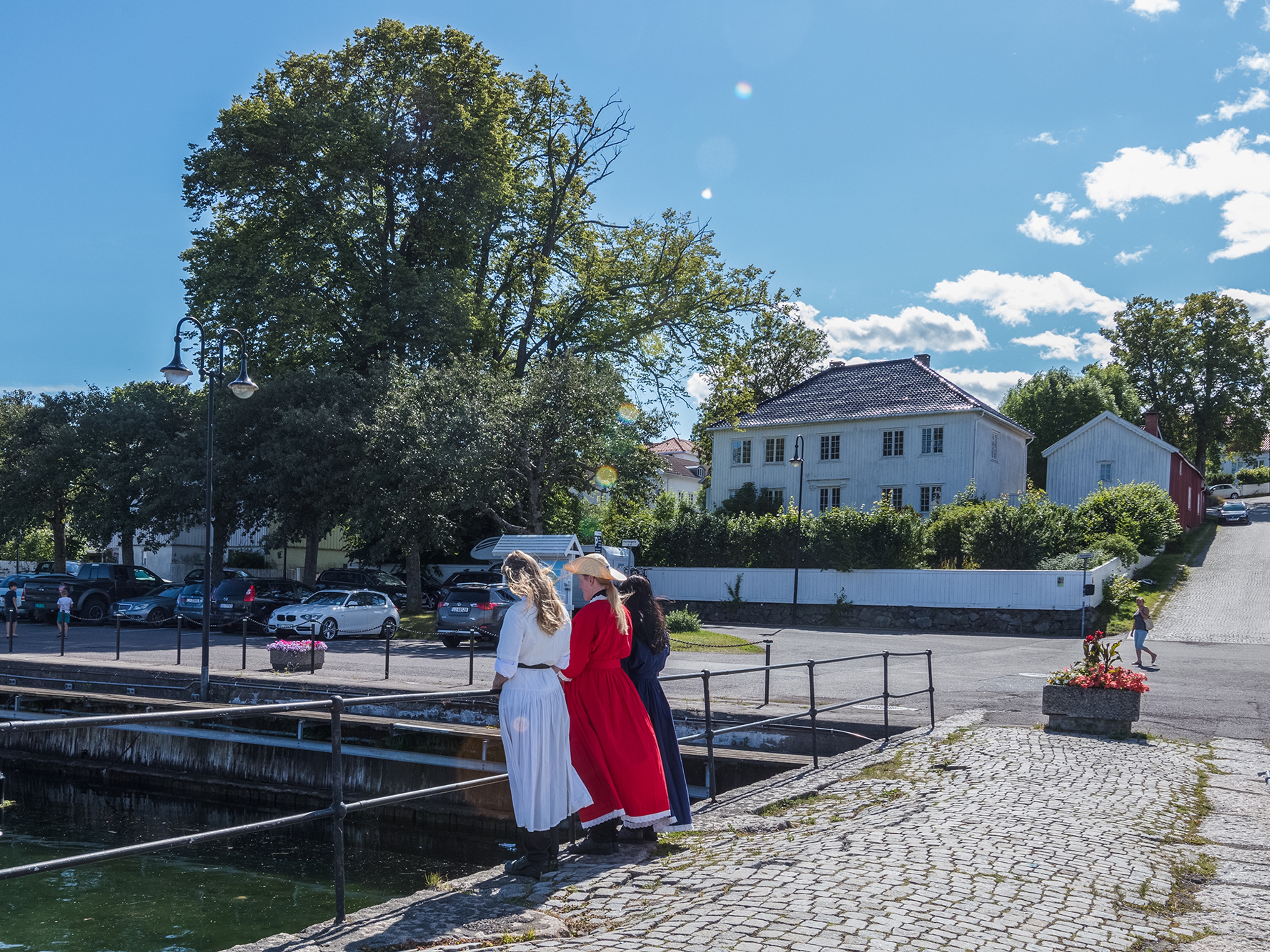 Three girls on a bridge in Åsgårdstrand in Vestfold, Eastern Norway - a remake of “The girls on the bridge" by Edvard Munch