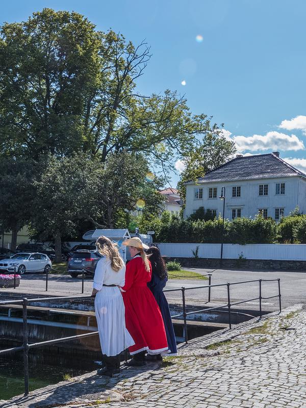 Three girls on a bridge in Åsgårdstrand in Vestfold, Eastern Norway - a remake of “The girls on the bridge" by Edvard Munch