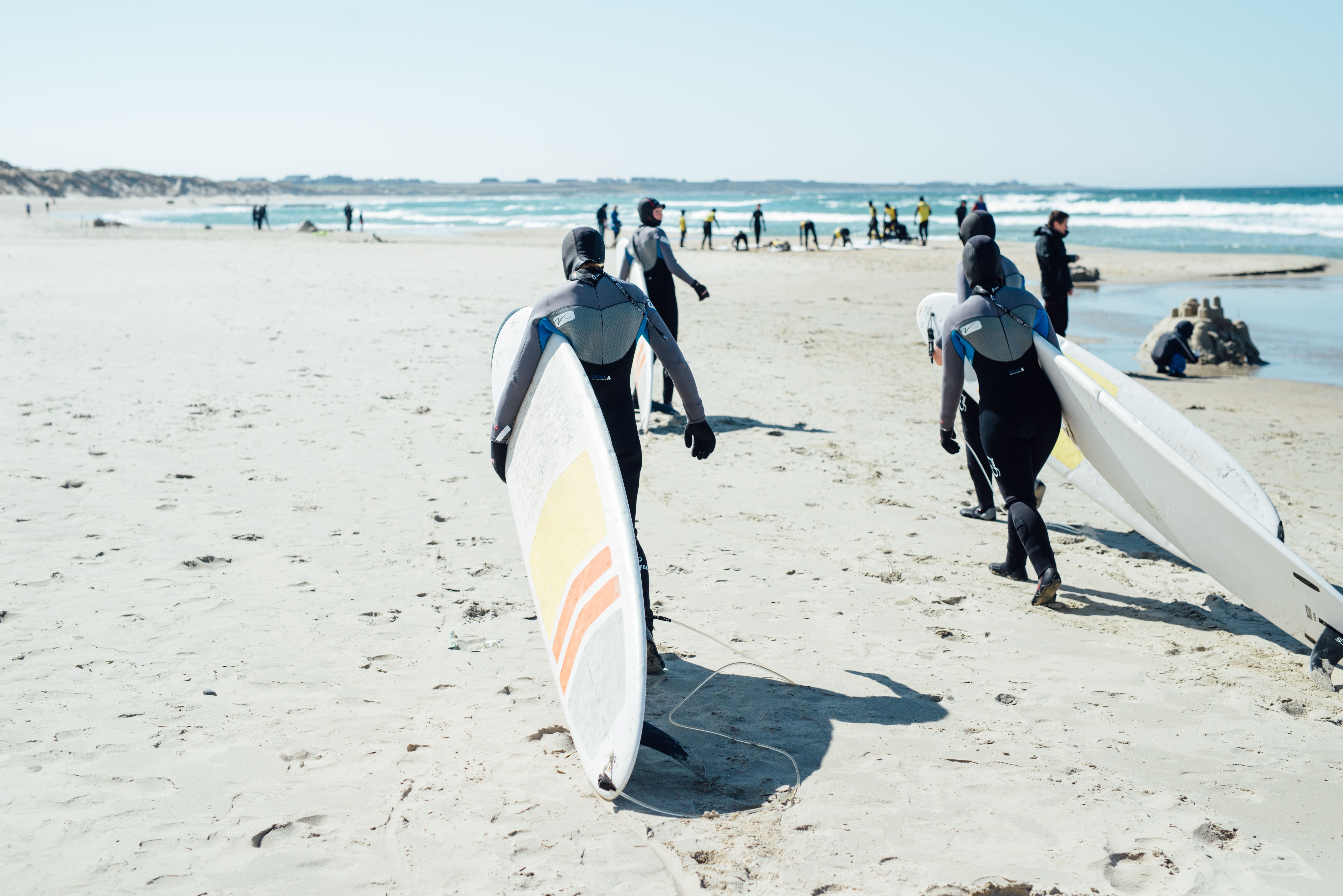 People surfing at Borestranda beach outside Stavanger in Fjord Norway