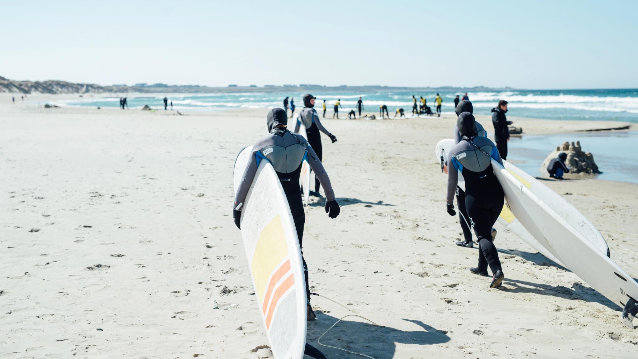People surfing at Borestranda beach outside Stavanger in Fjord Norway