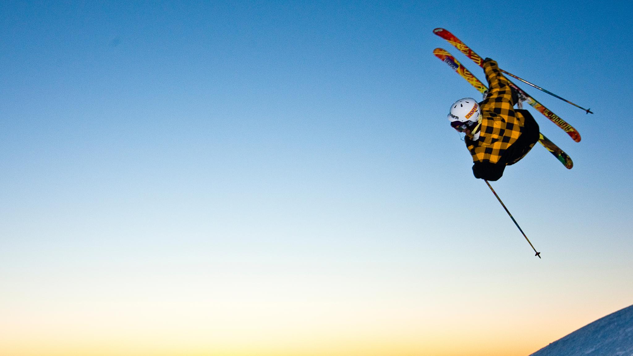 Skiers jumping in the slopes of Tusten Skiheiser, Molde