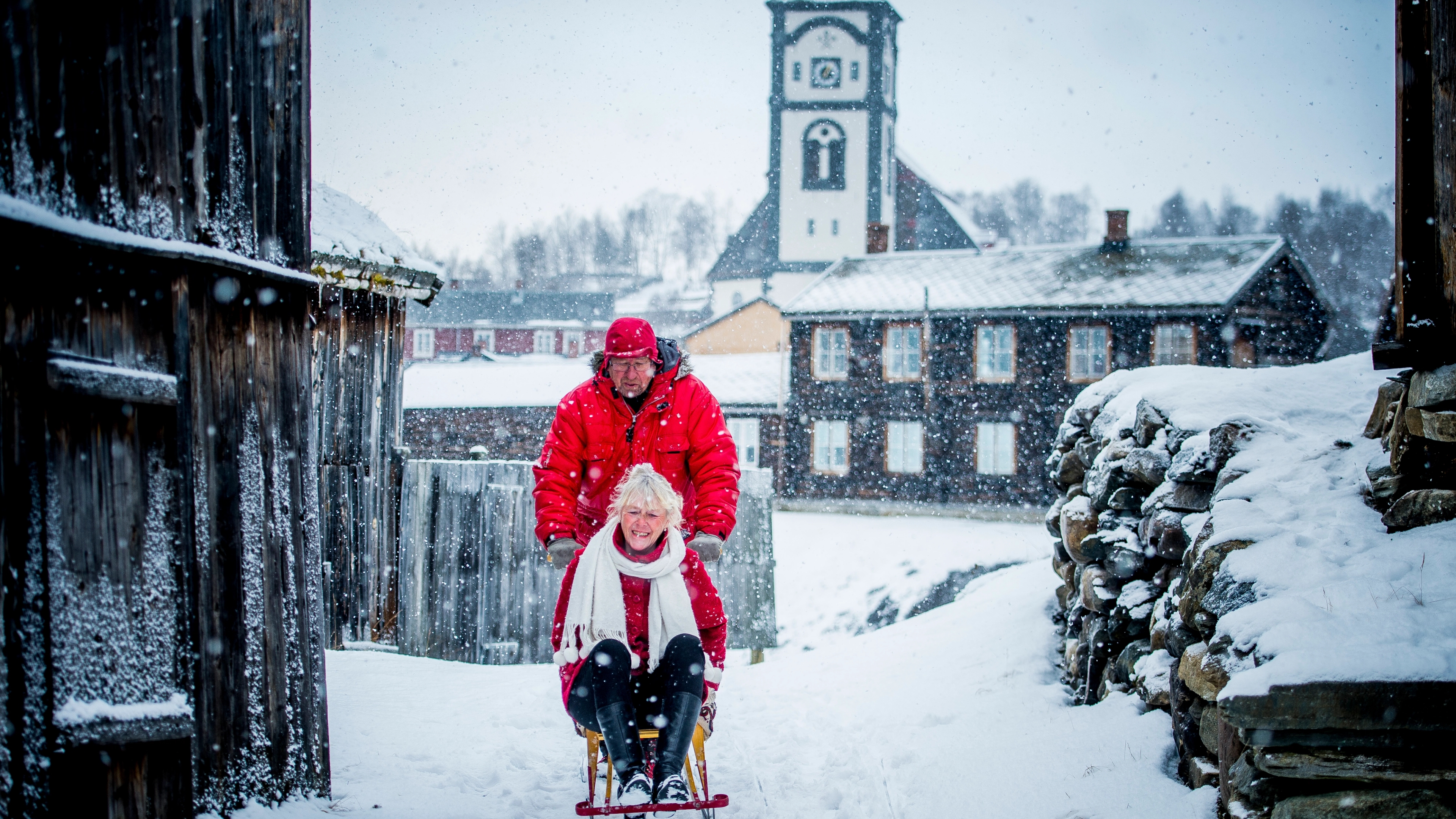 A couple at kicksledding at Røros in Trøndelag, Norway.