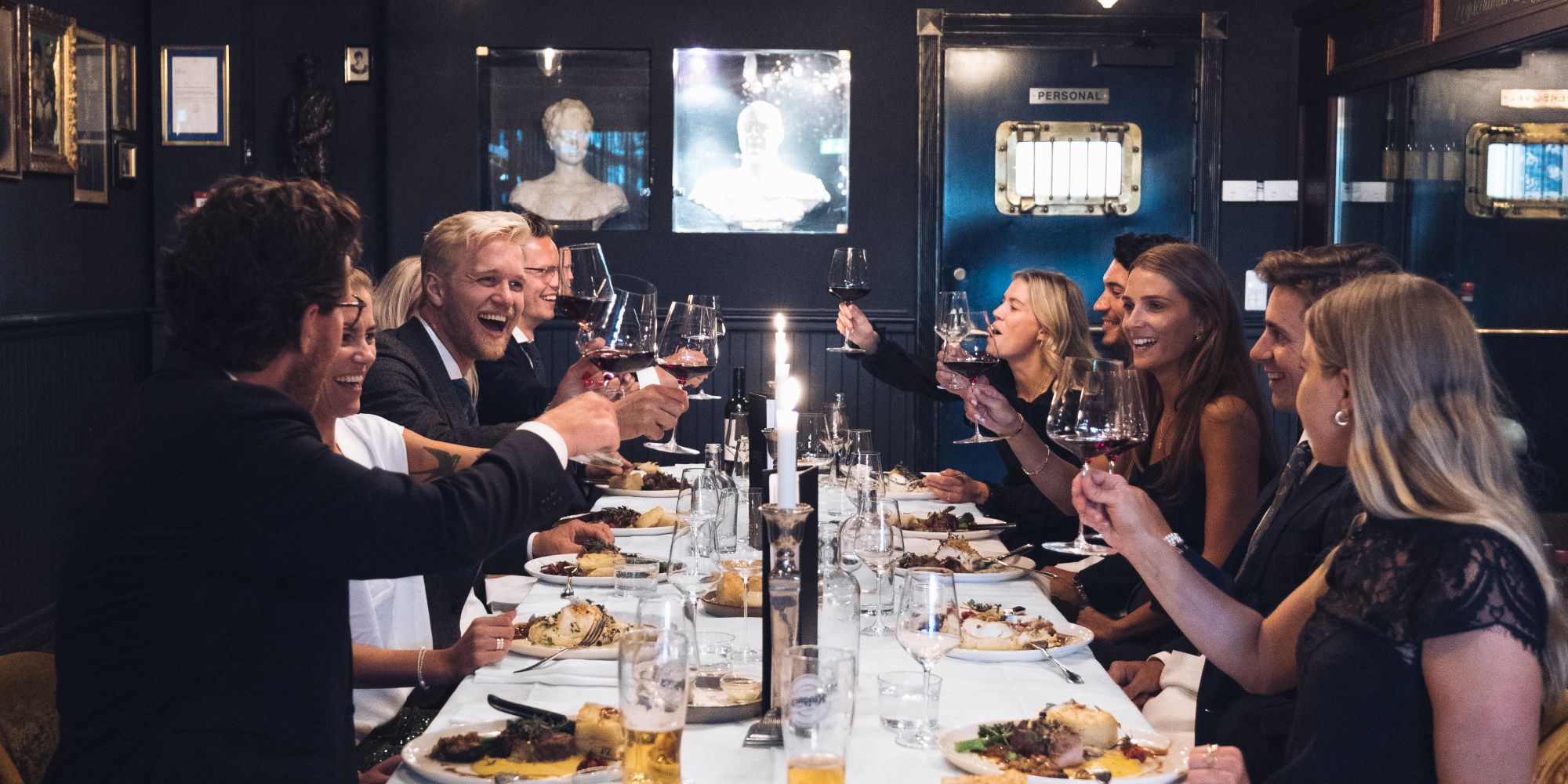 Friends eating a nice dinner at Louise Bar and Restaurant in Oslo