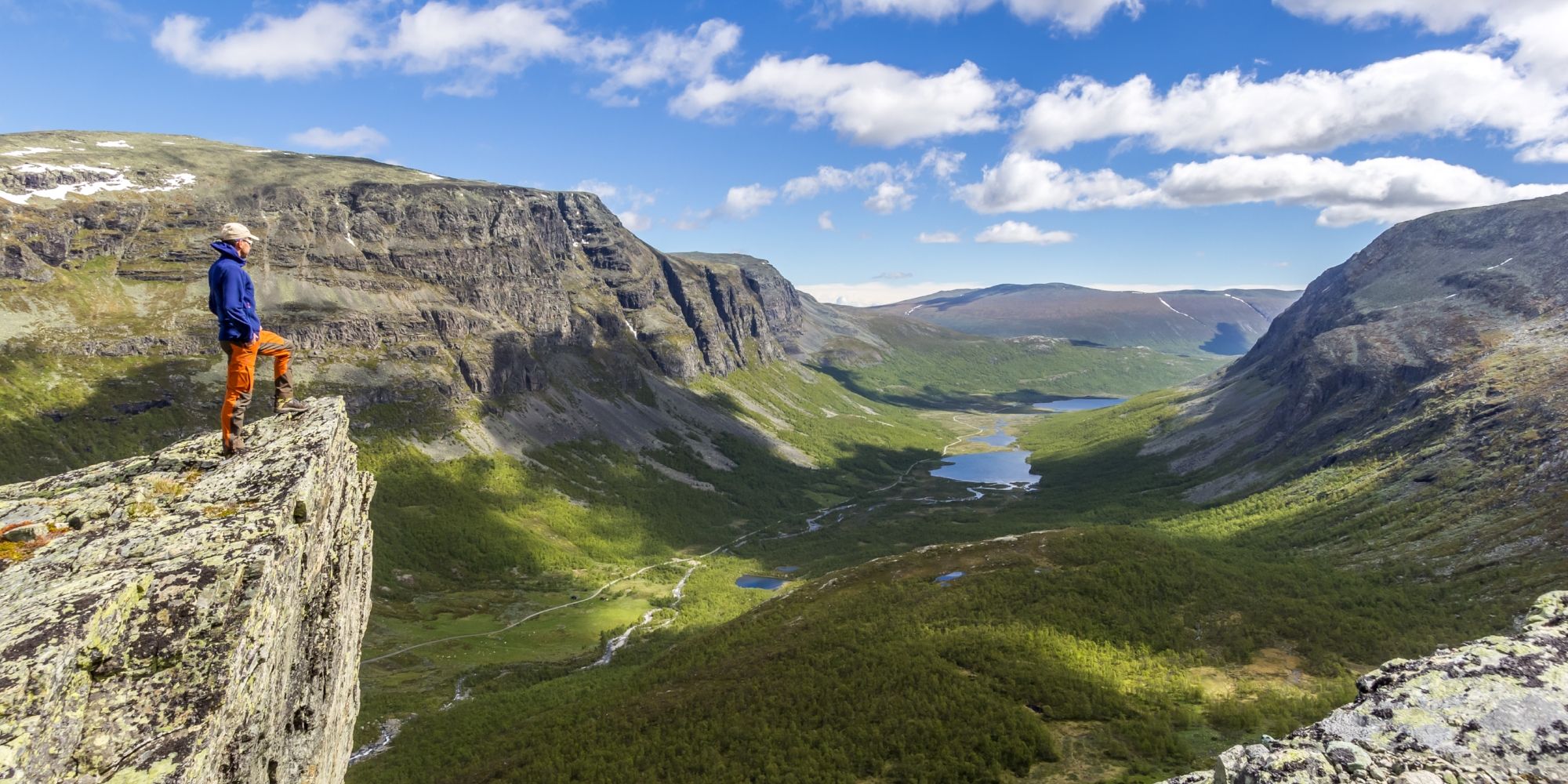A person hiking in the Hydalen valley near Hemsedal in Eastern Norway