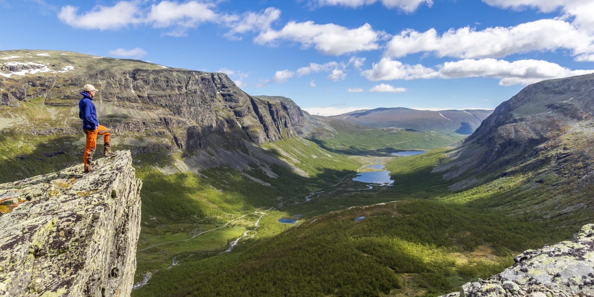 A person hiking in the Hydalen valley near Hemsedal in Eastern Norway