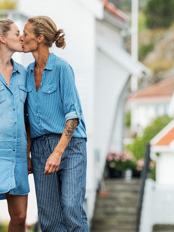 Two women are kissing in a street in Southern Norway