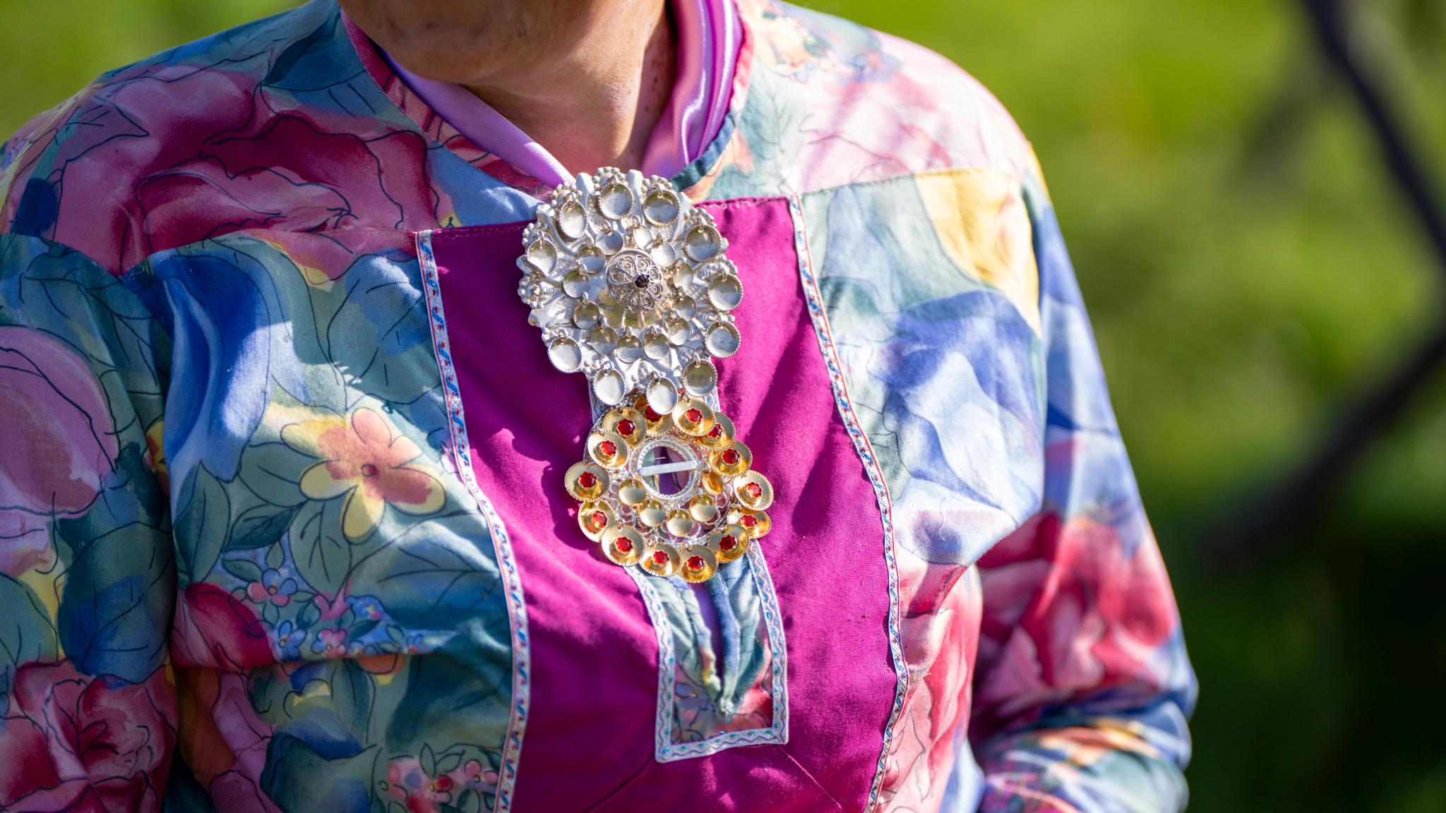 Ann-Kristine Bongo from Sami Siida in Alta wearing Sami Silver with her kofte