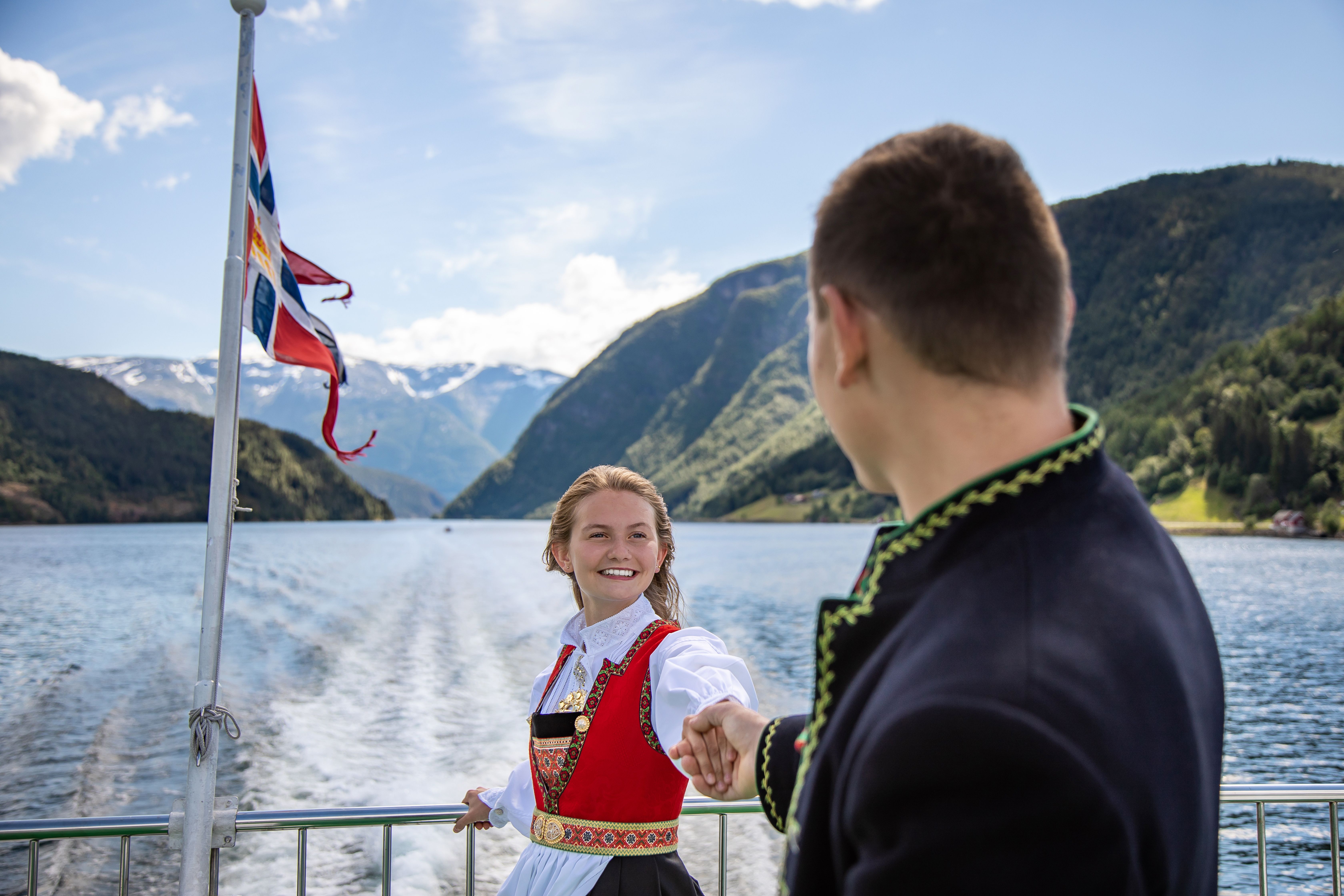 Girl wearing the Hardanger bunad on a Norled Ferry