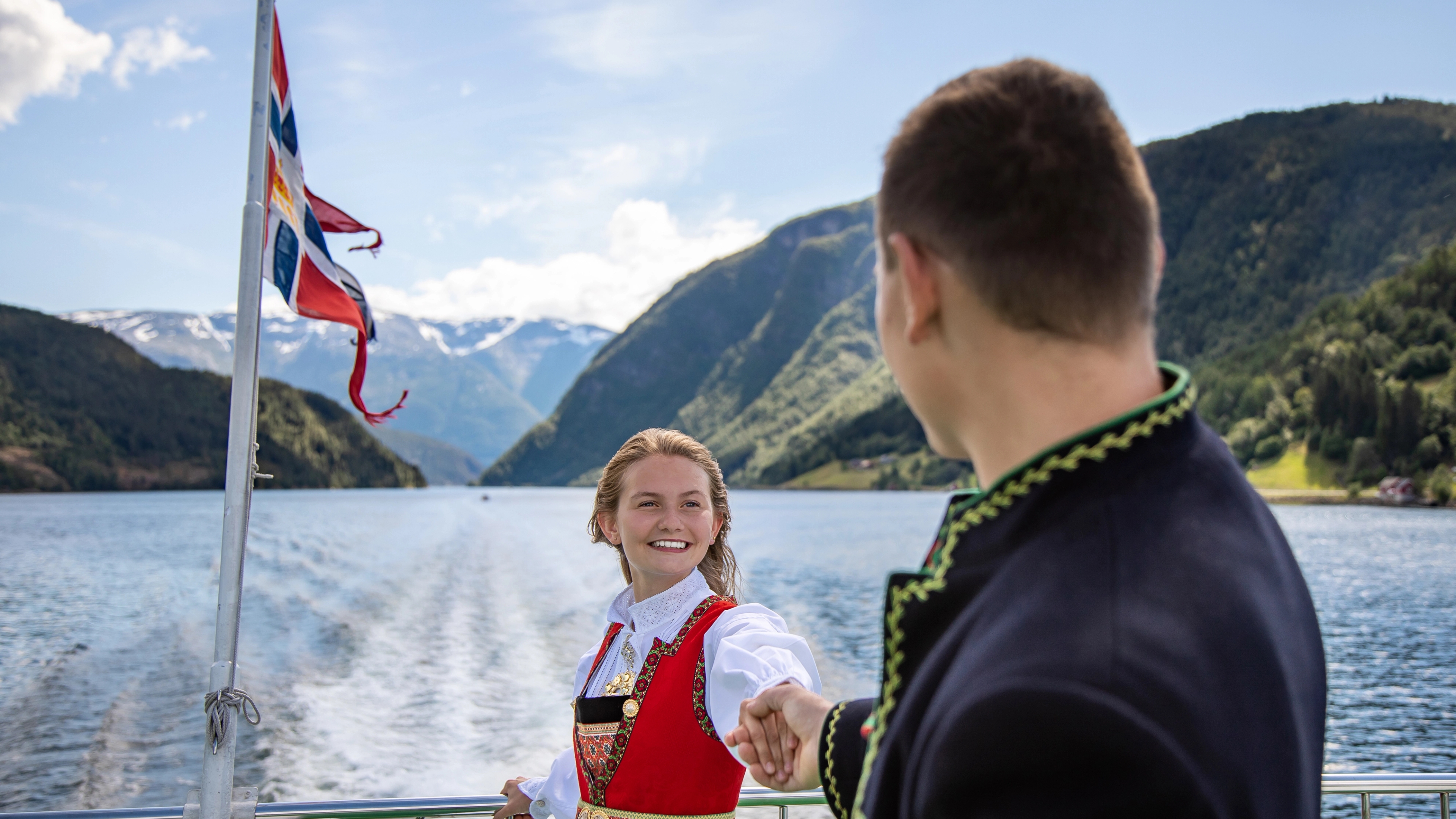 Girl wearing the Hardanger bunad on a Norled Ferry