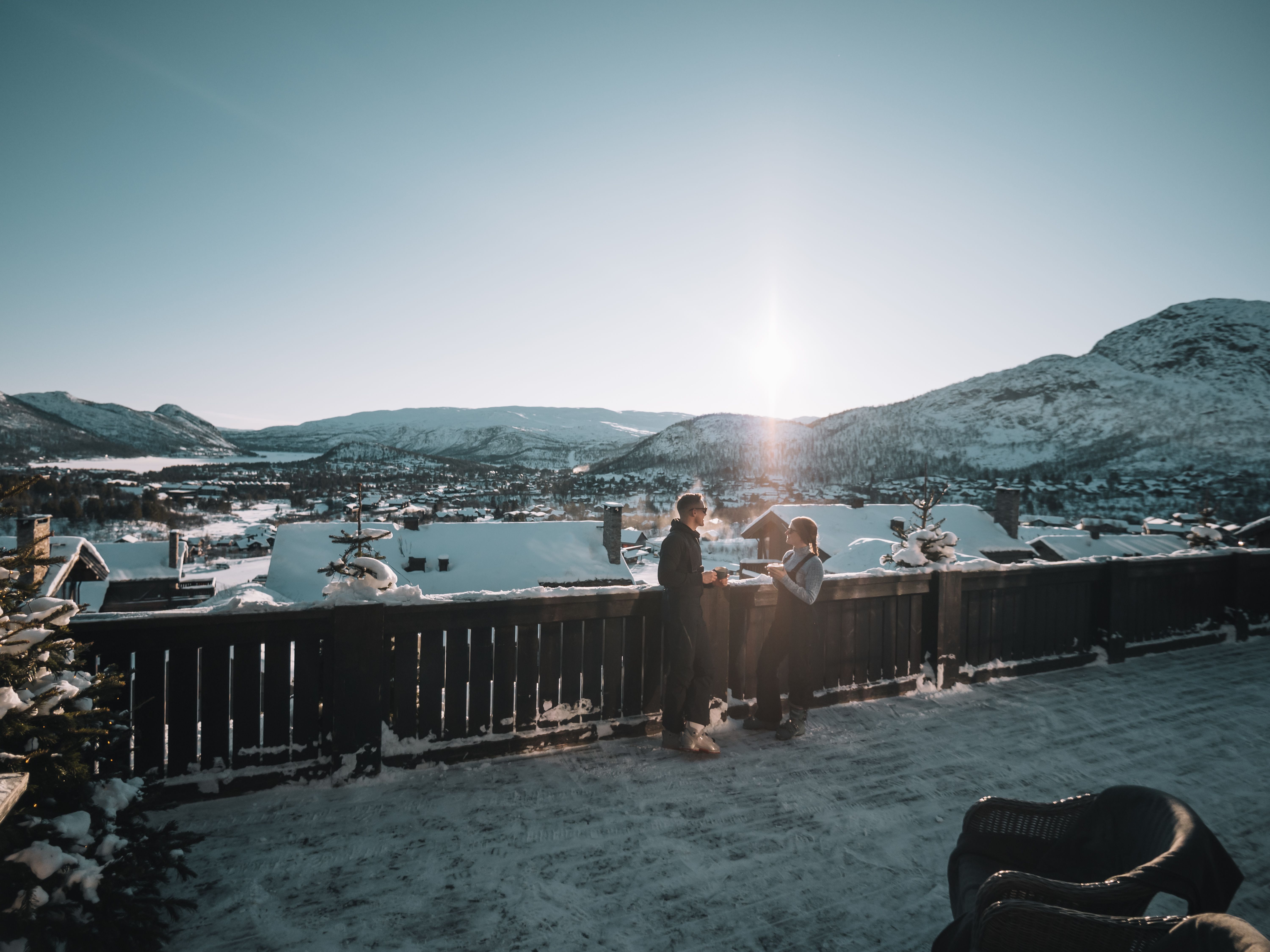 A couple on the terrace of Hovden Alpin Lodge in Southern Norway