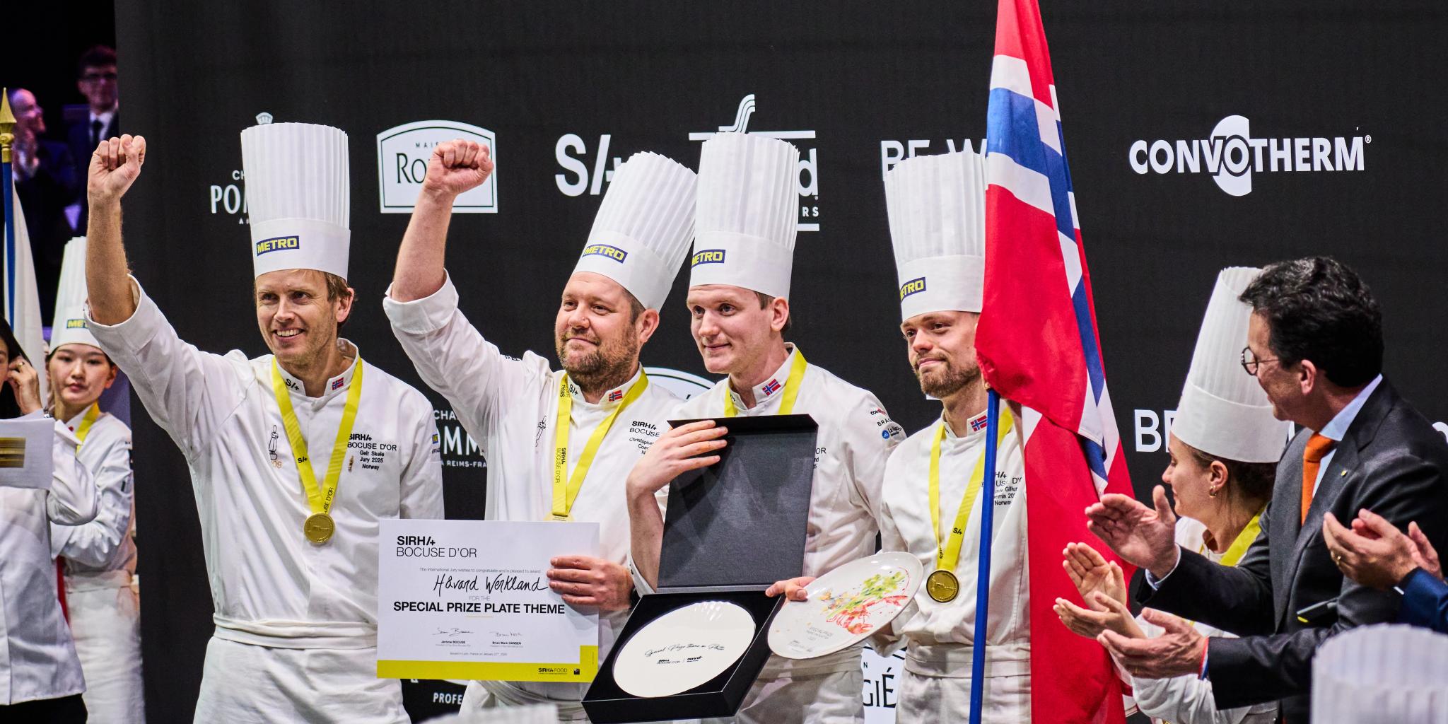 The four men that make up the Norwegian Bocuse d'Or team celebrating their award on the podium