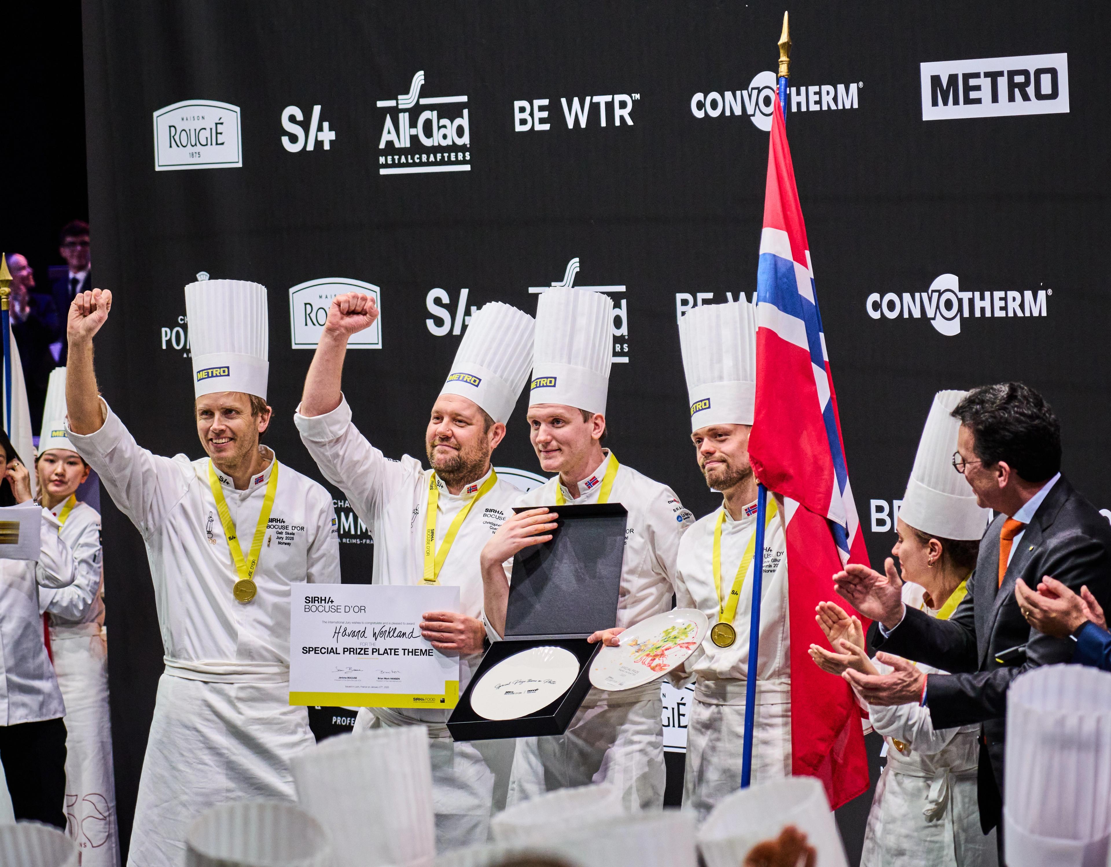 The four men that make up the Norwegian Bocuse d'Or team celebrating their award on the podium