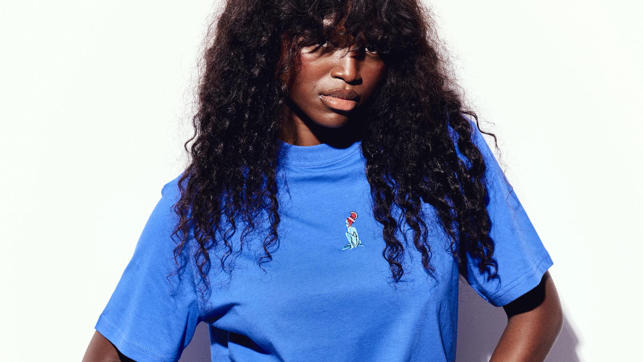 A model in blue Gombi clothing