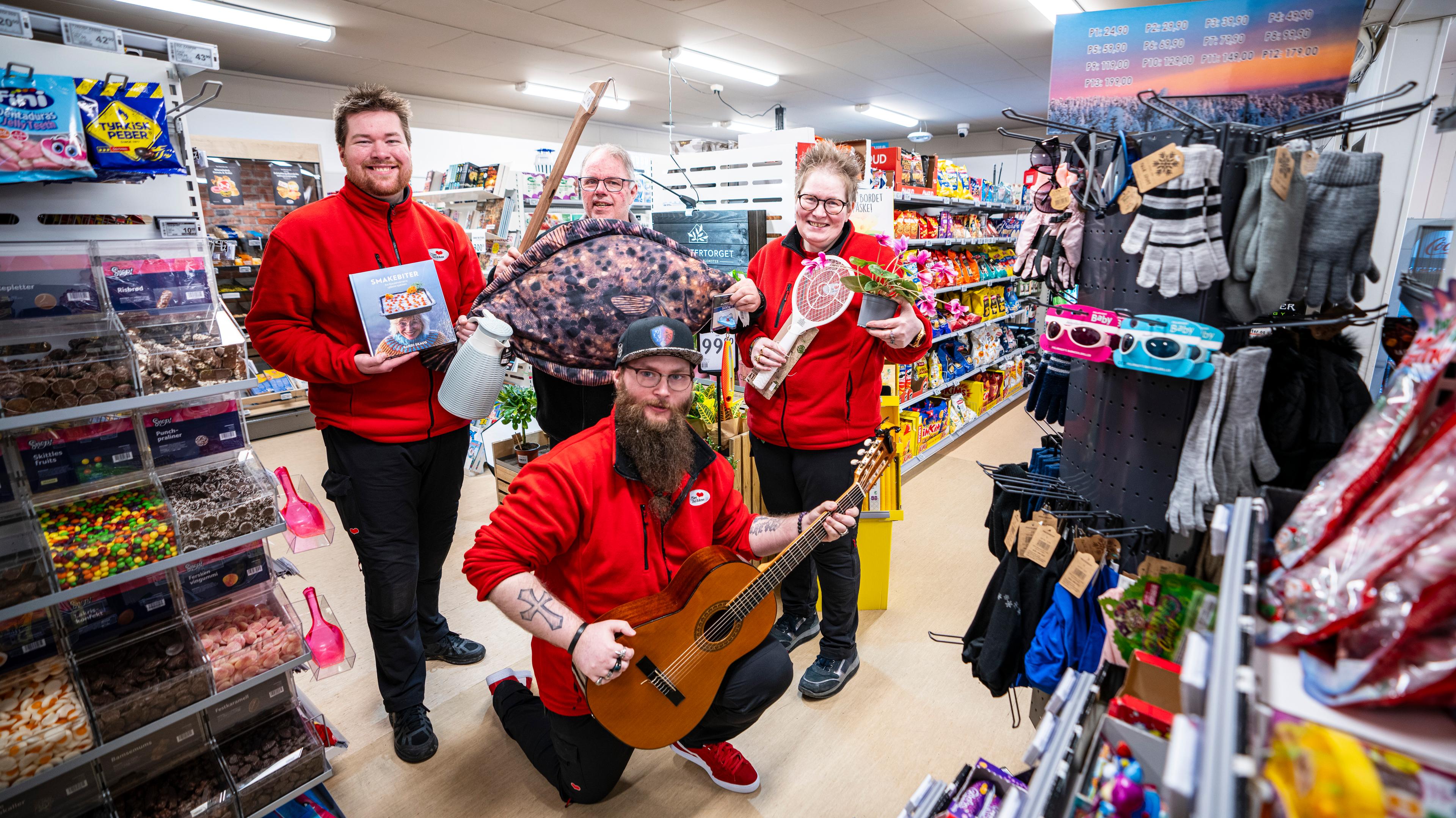 Four people in a local grocery shop in Steigen.