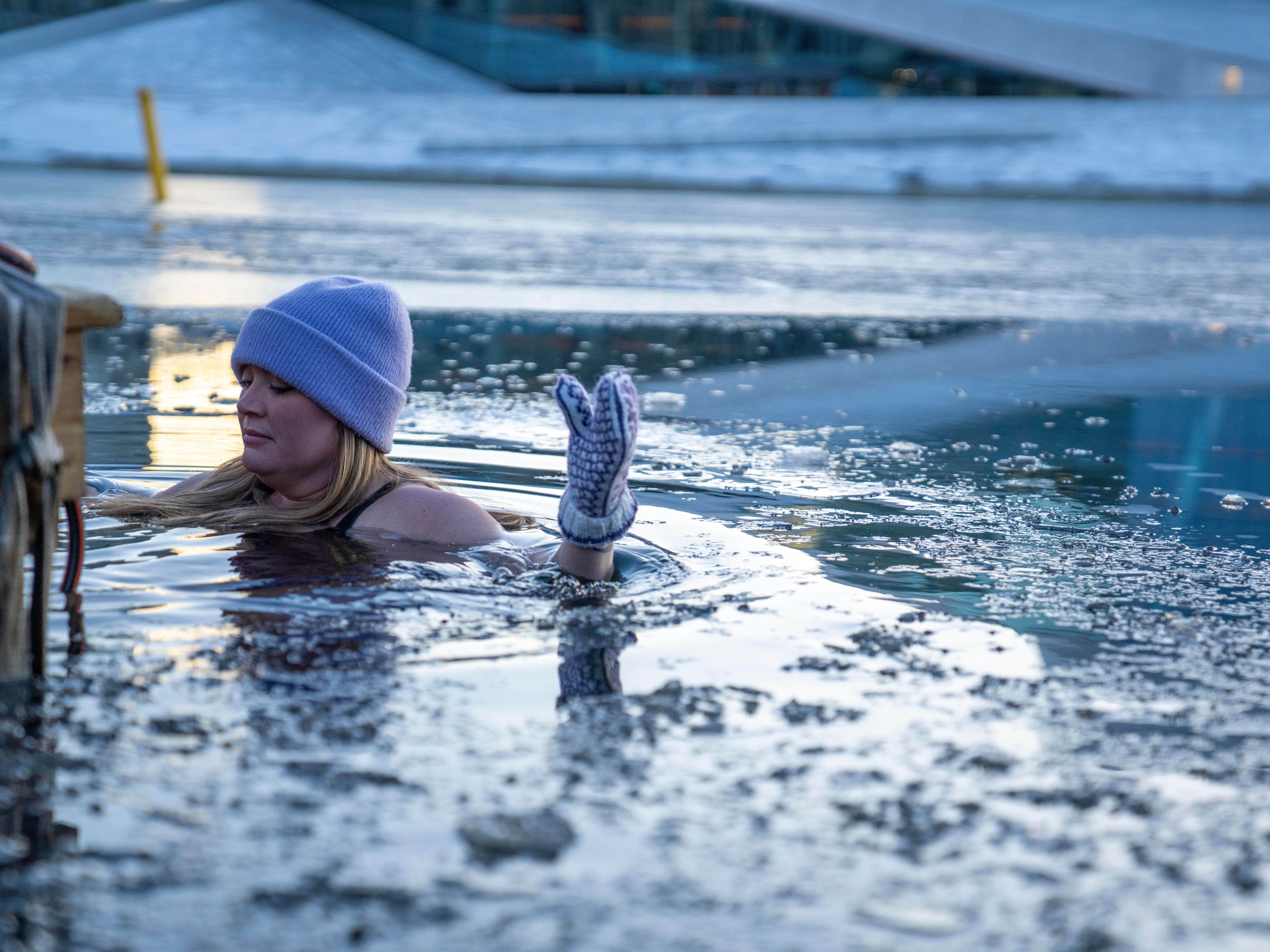 A girl ice bathing in the Oslofjord in Oslo, Eastern Norway