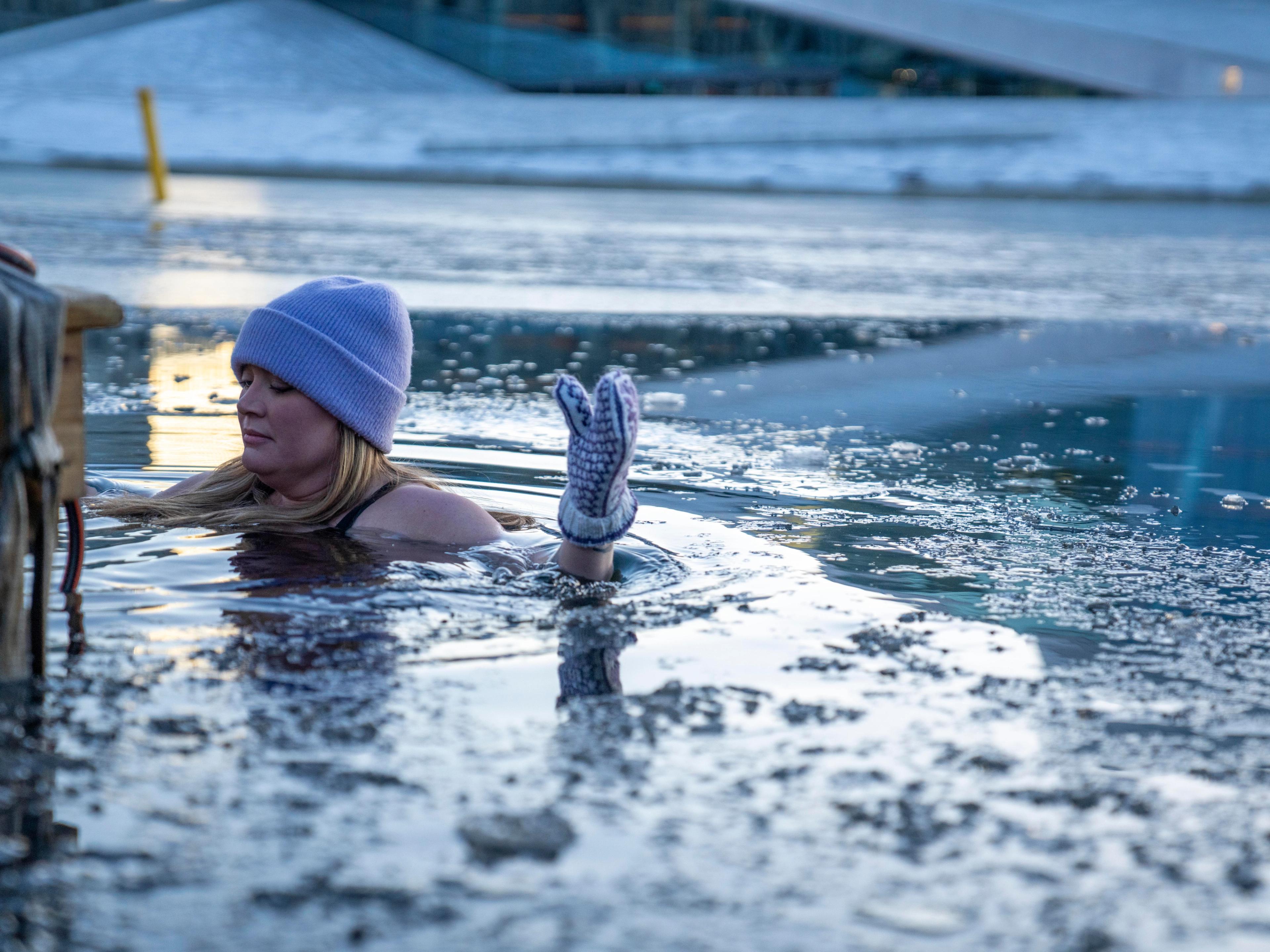 A girl ice bathing in the Oslofjord in Oslo, Eastern Norway