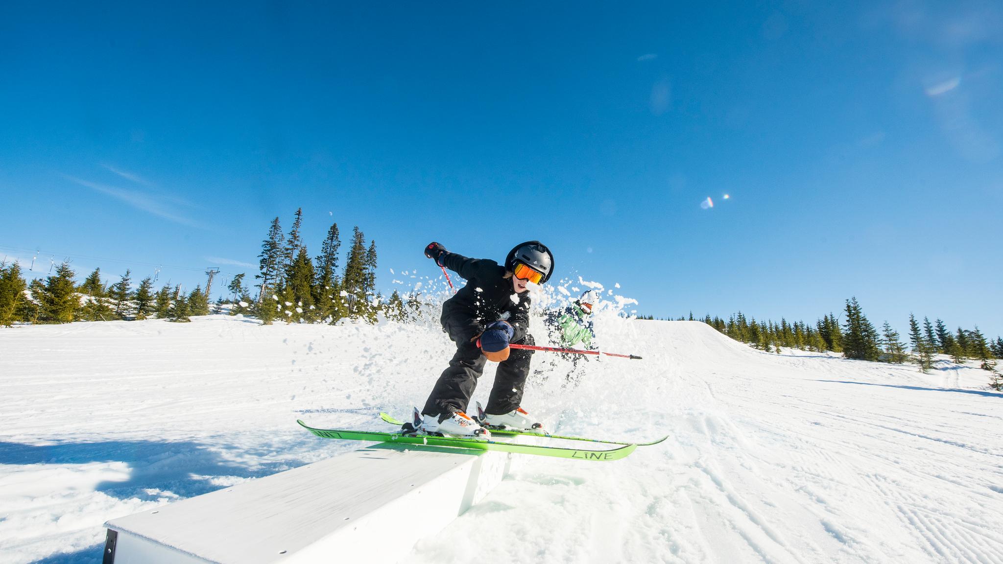 Child alpine skiing in terrain park, Hafjell Alpine Resort, Eastern Norway