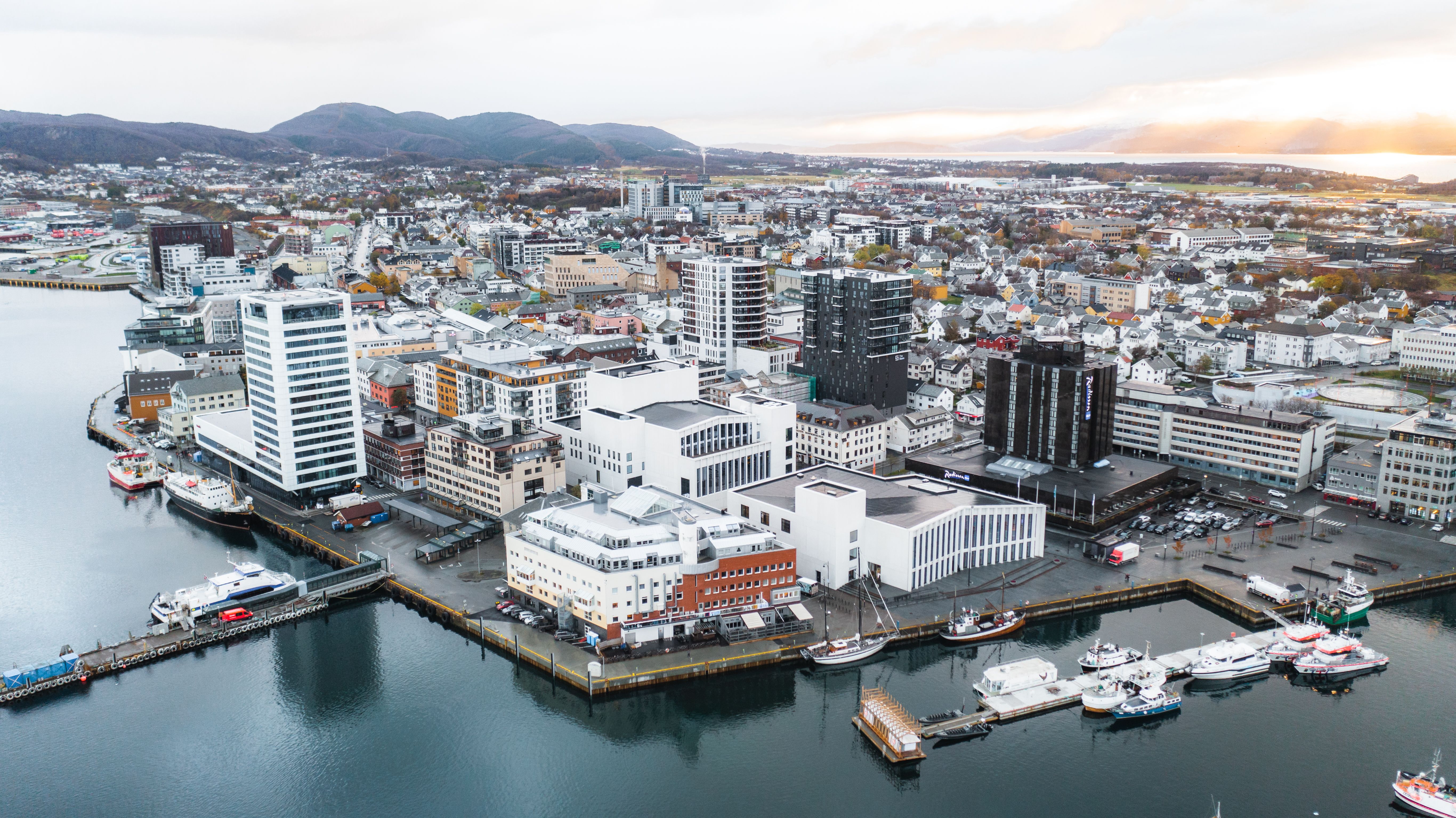 A drone picture of Bodø, with Kulturkvartalet Stormen, cultural centre by the harbour in the city centre
