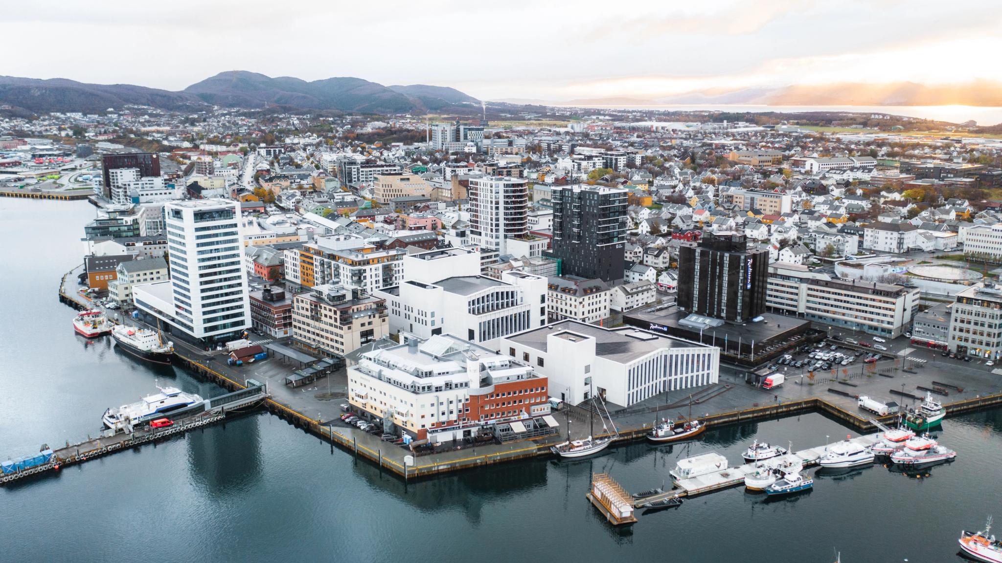 A drone picture of Bodø, with Kulturkvartalet Stormen, cultural centre by the harbour in the city centre