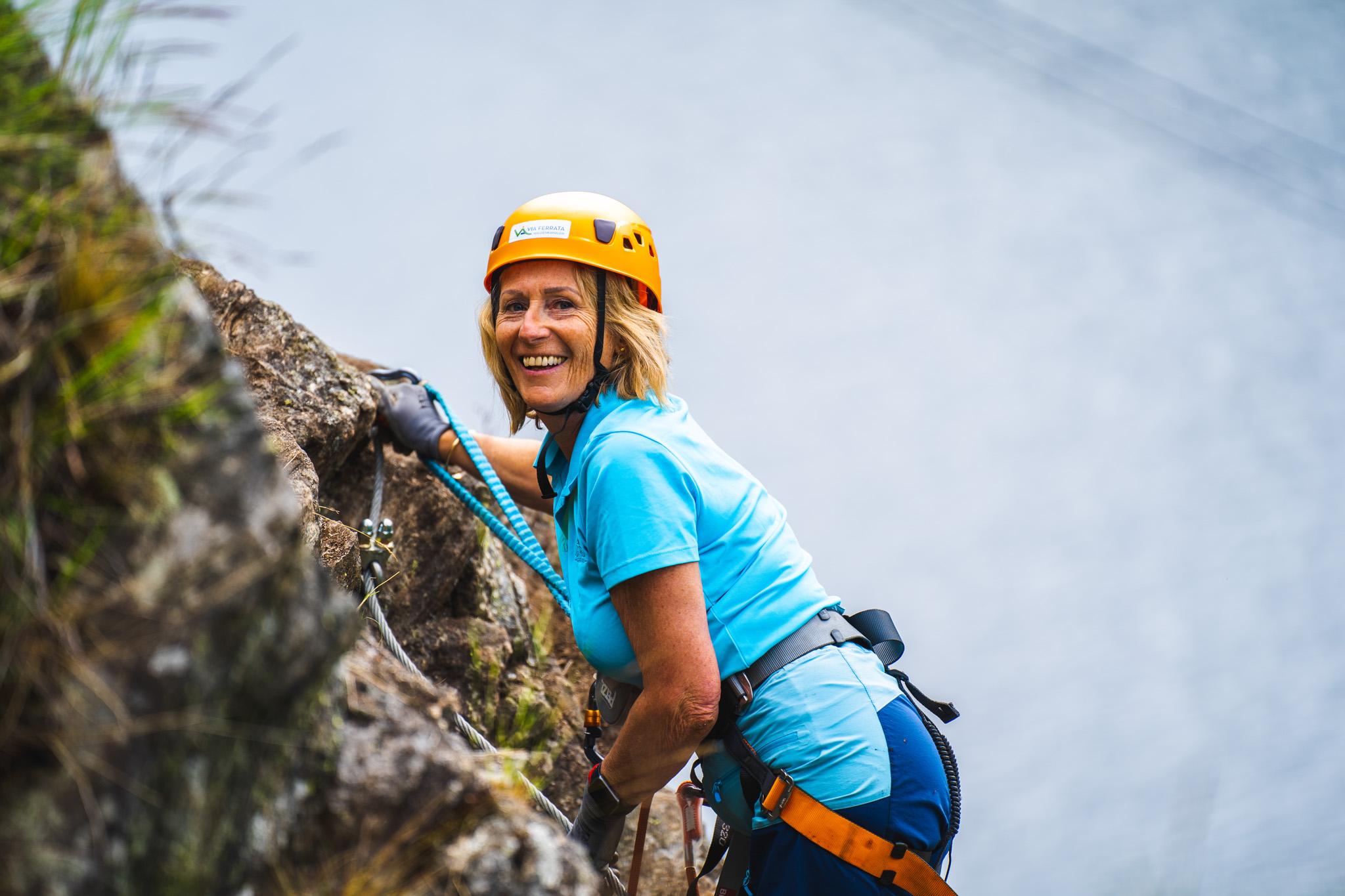 Woman climbing the Via Ferrata in Haldenkanalen
