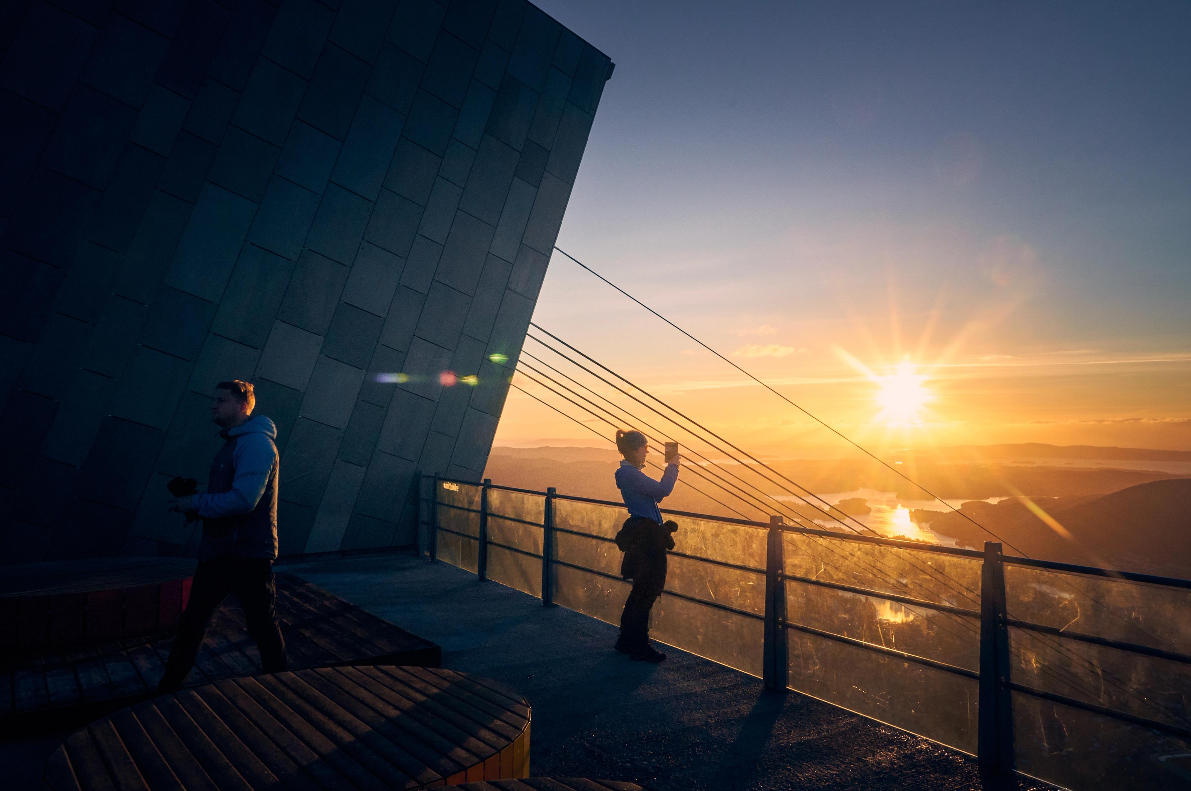 Hiking on Mount Ulriken, 643 meters above sea level, during sunset