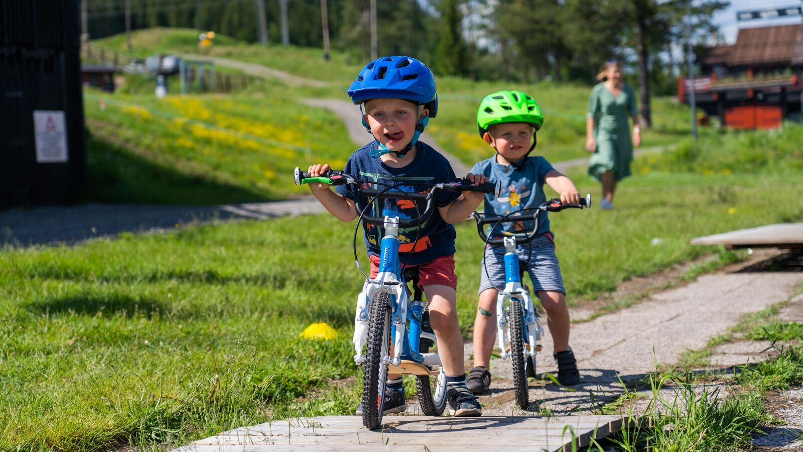 children ride bicycles in Trysil, Norway