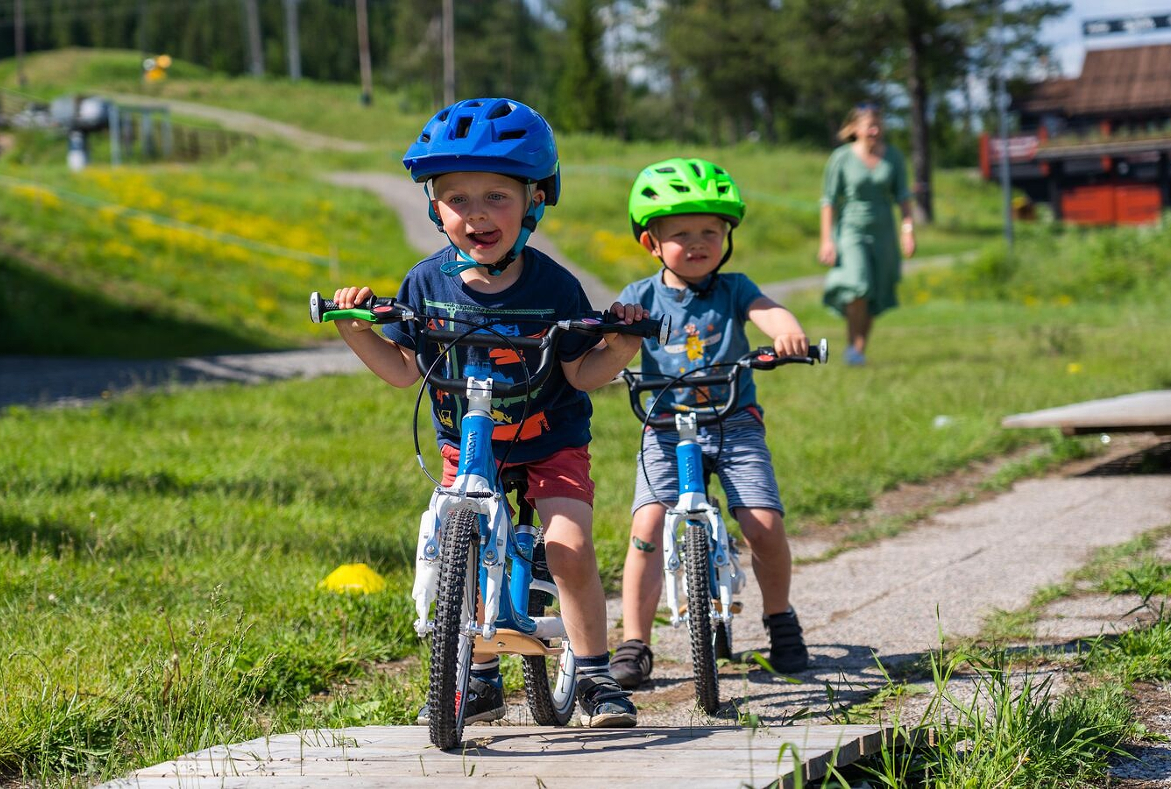 children ride bicycles in Trysil, Norway