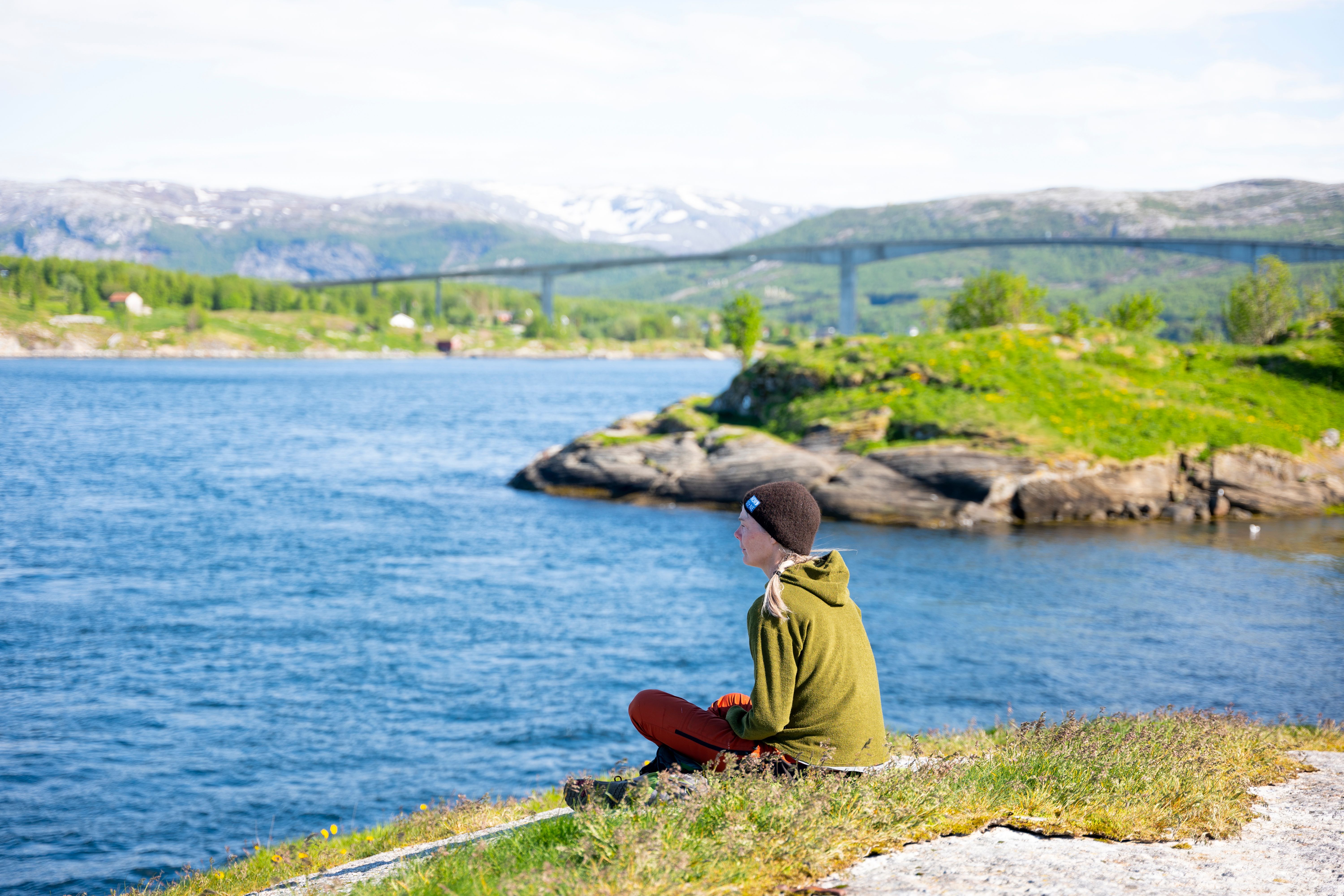 A woman looks at the Saltstraumen maelstrom outside of Bodø in Northern Norway.