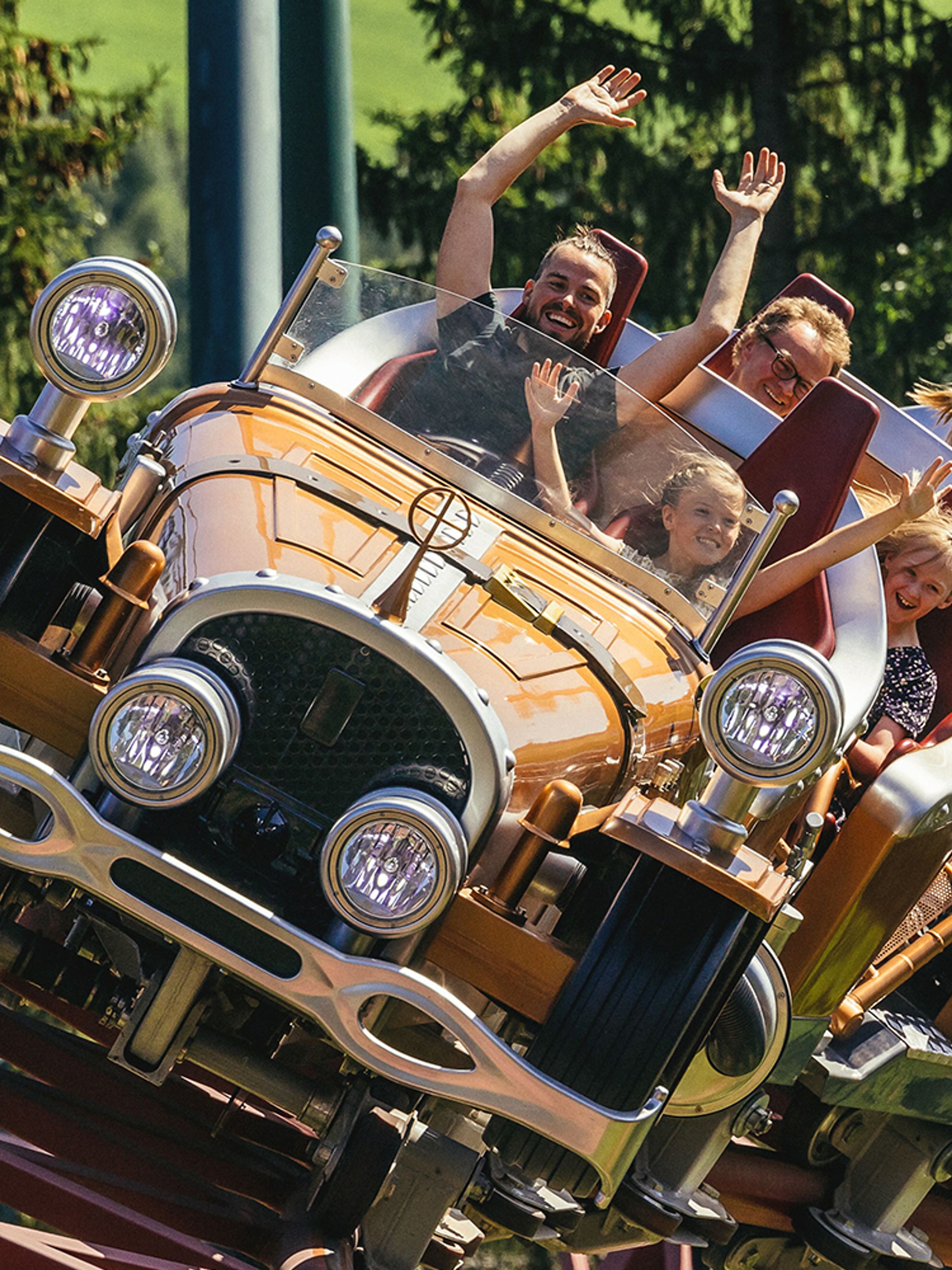 Families riding a rollercoaster in Hunderfossen.