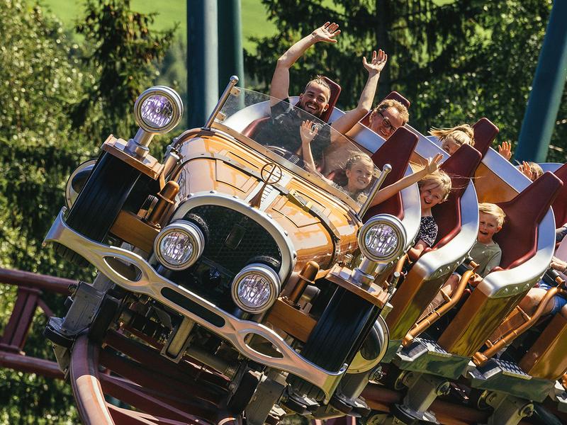 Families riding a rollercoaster in Hunderfossen.