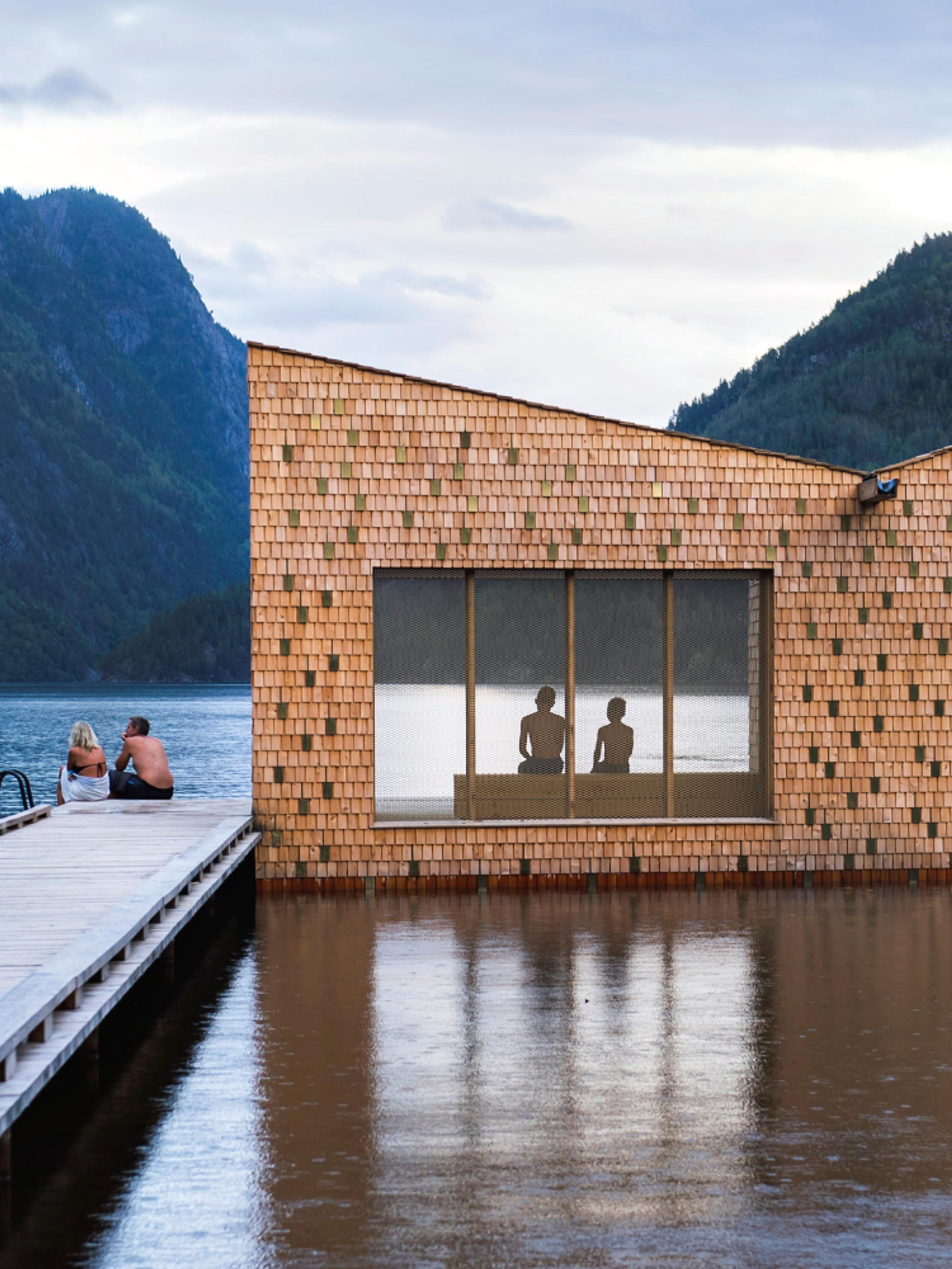 People enjoying the floating Soria Moria sauna in Telemark