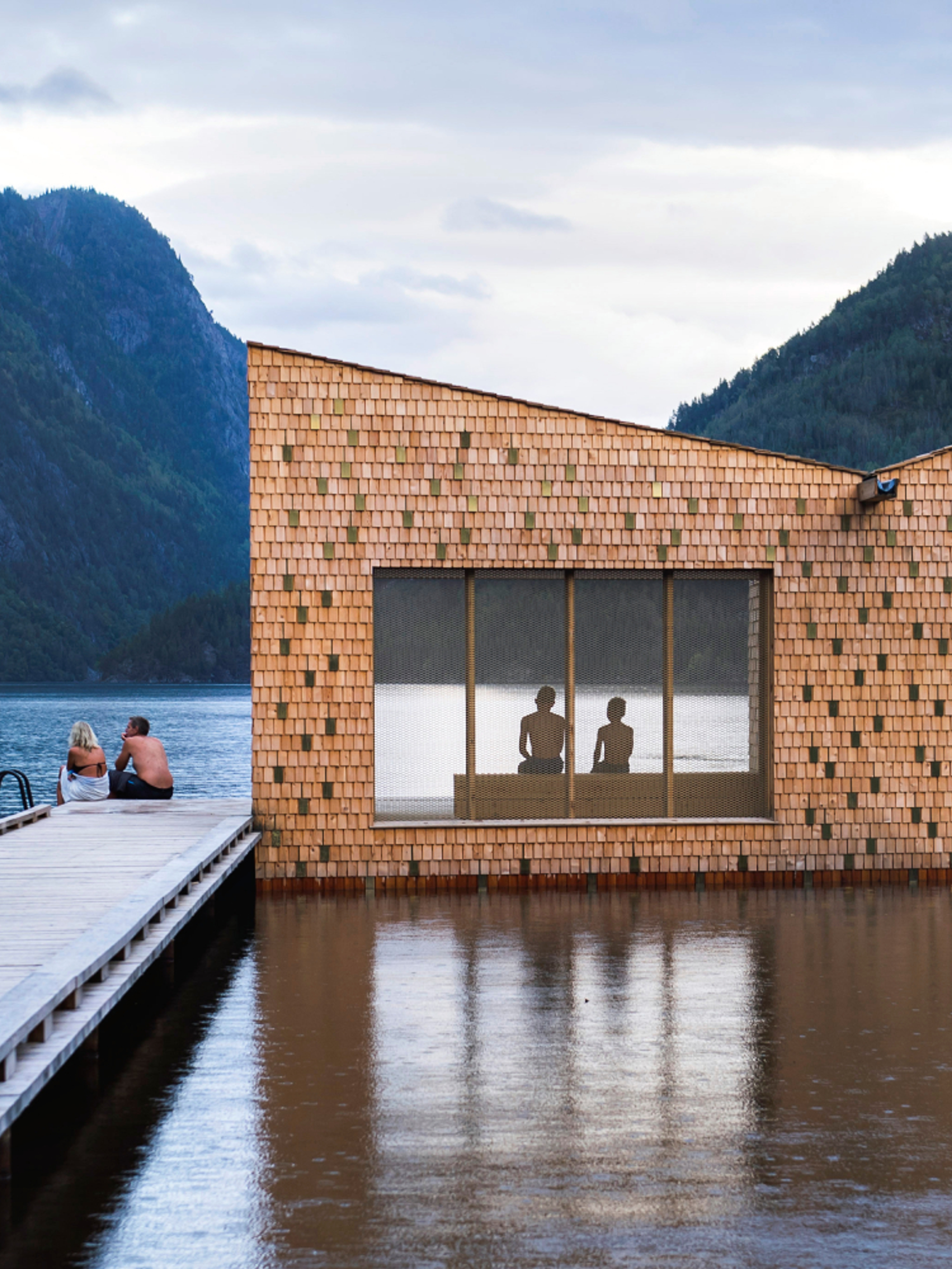 People enjoying the floating Soria Moria sauna in Telemark