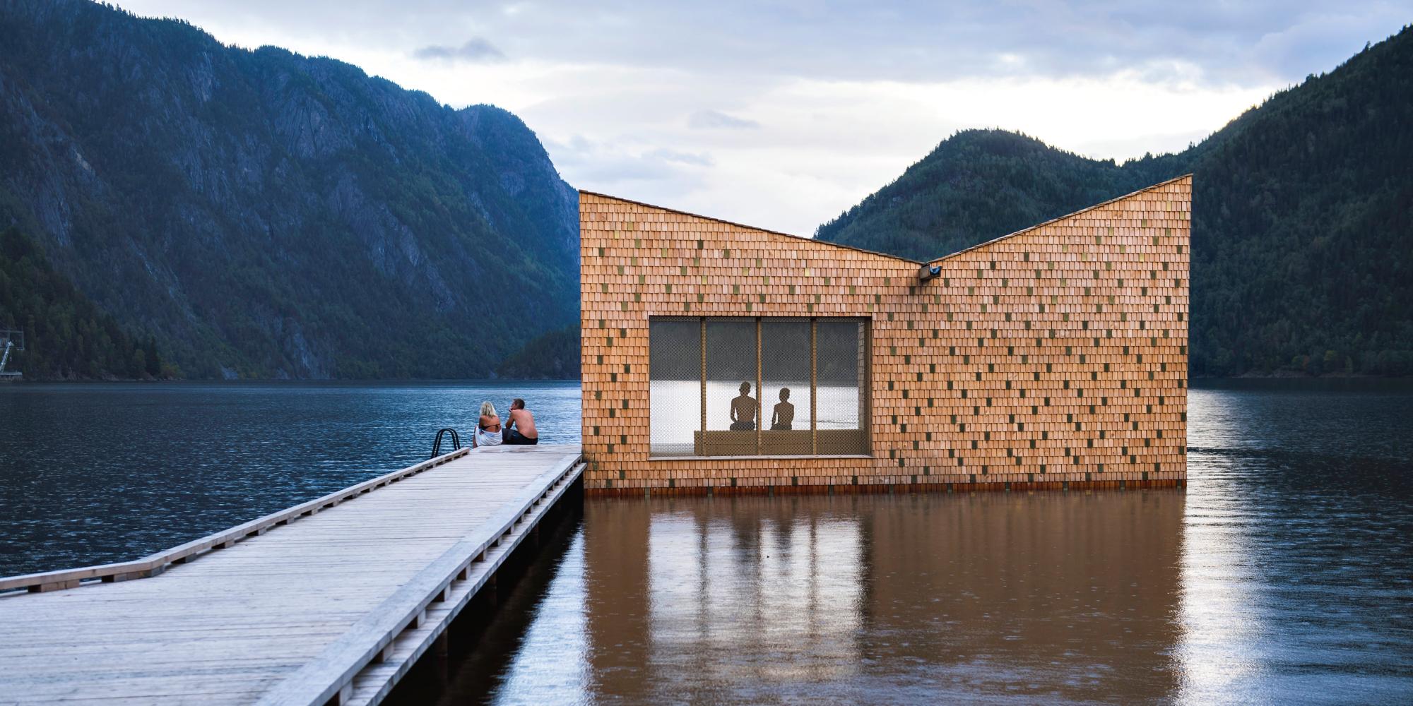 People enjoying the floating Soria Moria sauna in Telemark