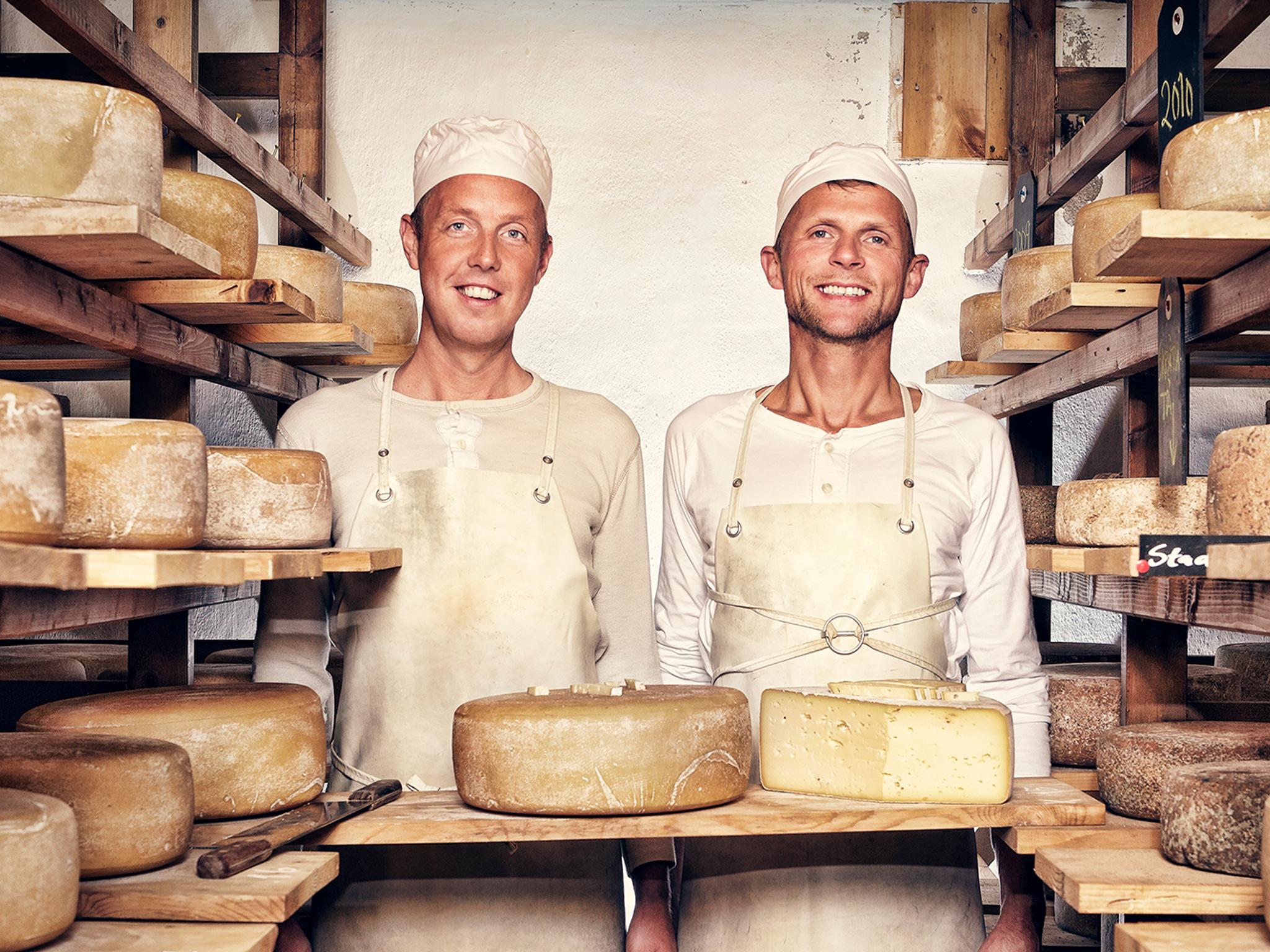 Two men in the cheese factory at Brimi Sæter in Jotunheimen, Eastern Norway