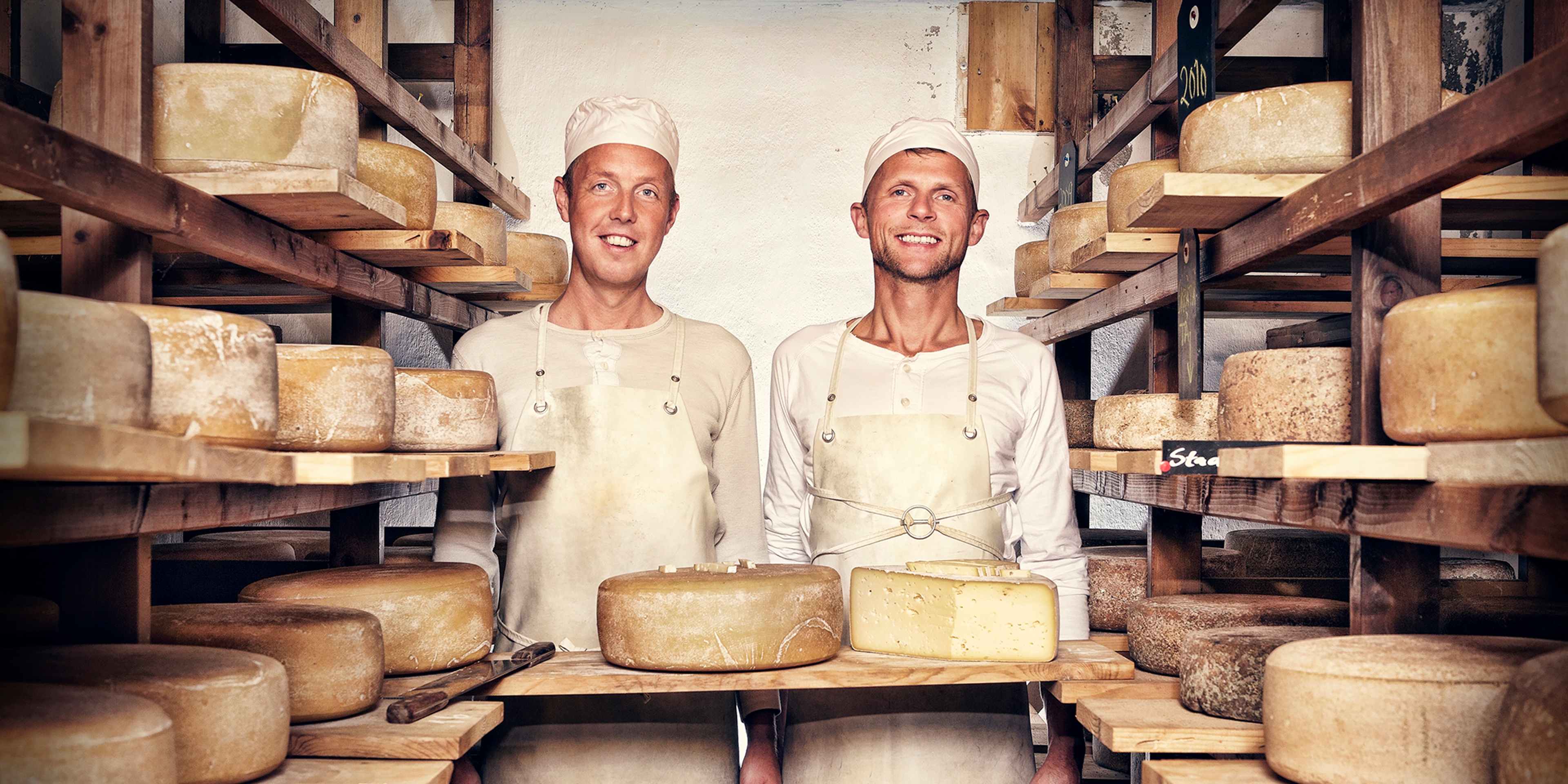 Two men in the cheese factory at Brimi Sæter in Jotunheimen, Eastern Norway
