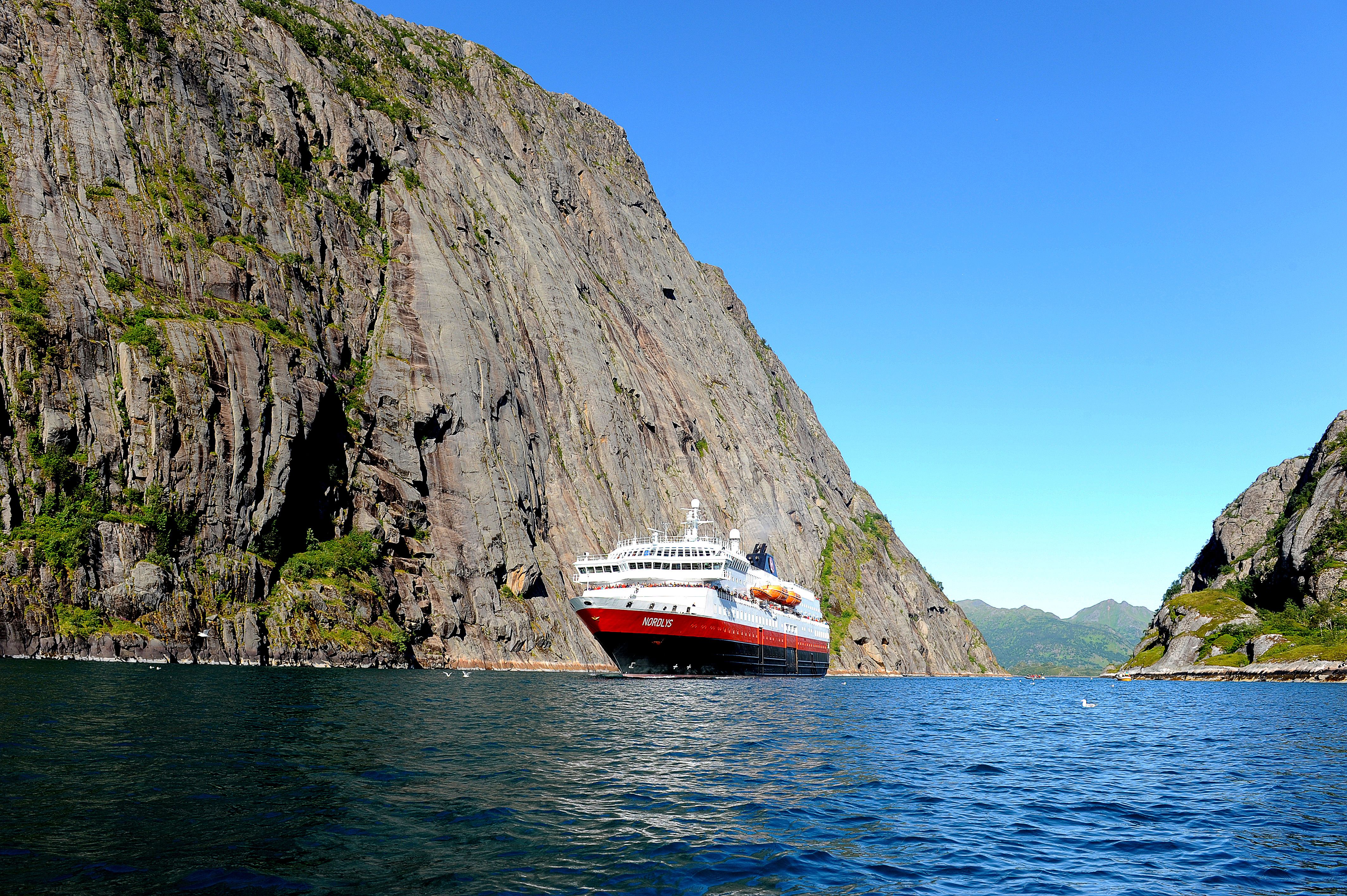 A Hurtigruten ship on the narrow Trollfjord in Northern Norway